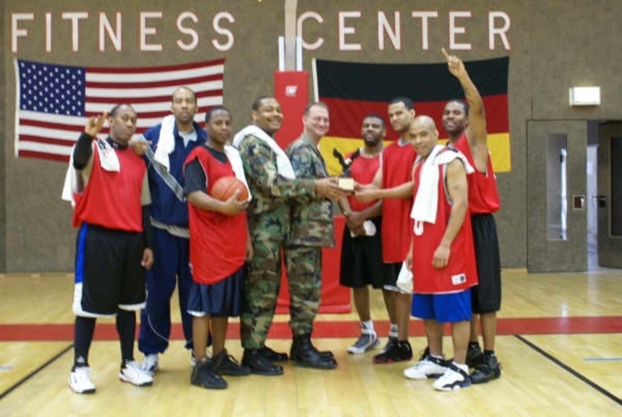 SPANGDAHLEM AIR BASE, Germany -- The 52nd MDG Over 30 Team enjoys their 2008-2009 Over 30 tournament victory Feb. 6, 2009.  (U.S. Air Force photo by Mark Geairn)