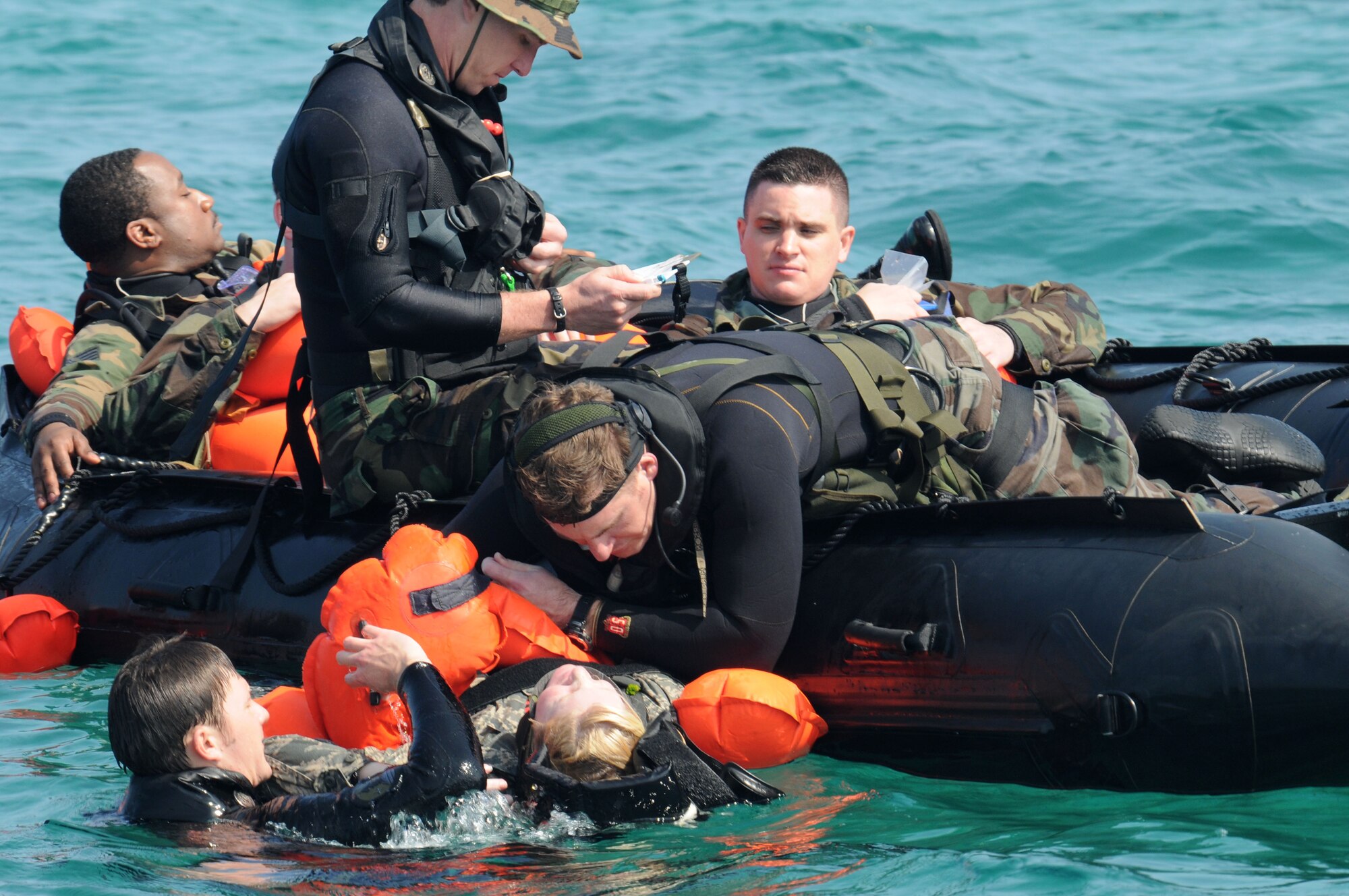 Pararescuemen assigned to the 31st Rescue Squadron, Kadena Air Base, Japan assess simulated victims, as part of a training scenario during exercise Cope Angel 09-1, Feb. 12, 2009. Cope Angel is a joint rescue exercise between members of the U.S. Air Force and the Japanese Air Self Defense Force.  (U.S. Air Force photo/Staff Sgt Chrissy Best)