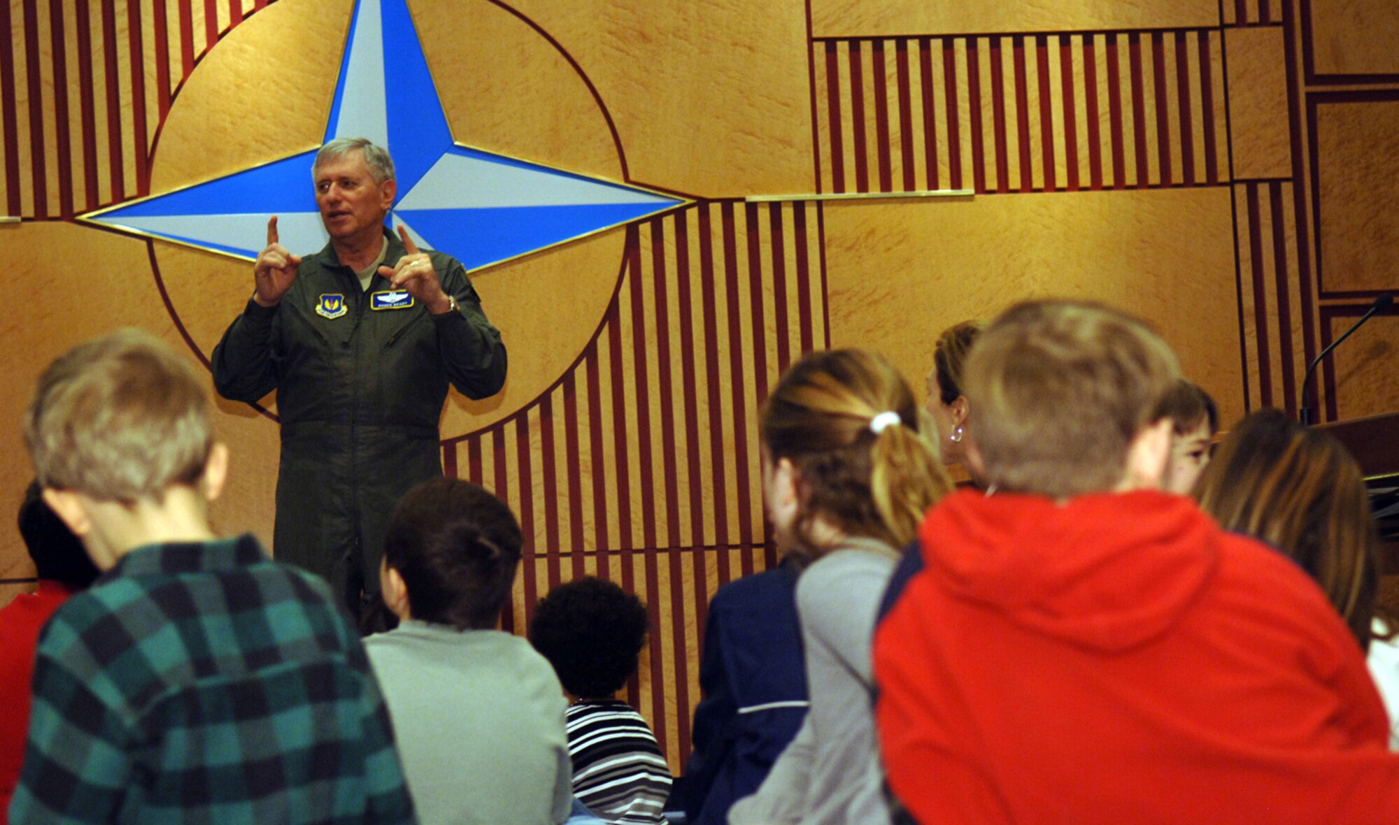Gen. Roger A. Brady, United States Air Forces in Europe commander, speaks to more than 40 children of Headquarters USAFE people during HQUSAFE Job Shadow Day. General Brady talked to the children about his job as the commander, the importance of what their parents do for the Air Force while living and working in Europe, and then answered questions on a variety of topics. Some of the questions asked by the children to COMUSAFE included: what were his favorite college and professional football teams; where did he go to school; what are his favorite parts of his job; what he thought of Unmanned Aerial Vehicles; and, what he wanted to be when he grew up?

Job Shadow Day is a nationwide effort to introduce young people to the working community through active participation. Job shadowing is an academically motivating activity designed to give children the unique opportunity of an up-close look at the world of work and provide first-hand answers to their questions. The students shadowed their sponsor or a workplace mentor and completed a half-day on the job as part of the program. (U.S. Air Force photo by Senior Airman Levi Riendeau)
