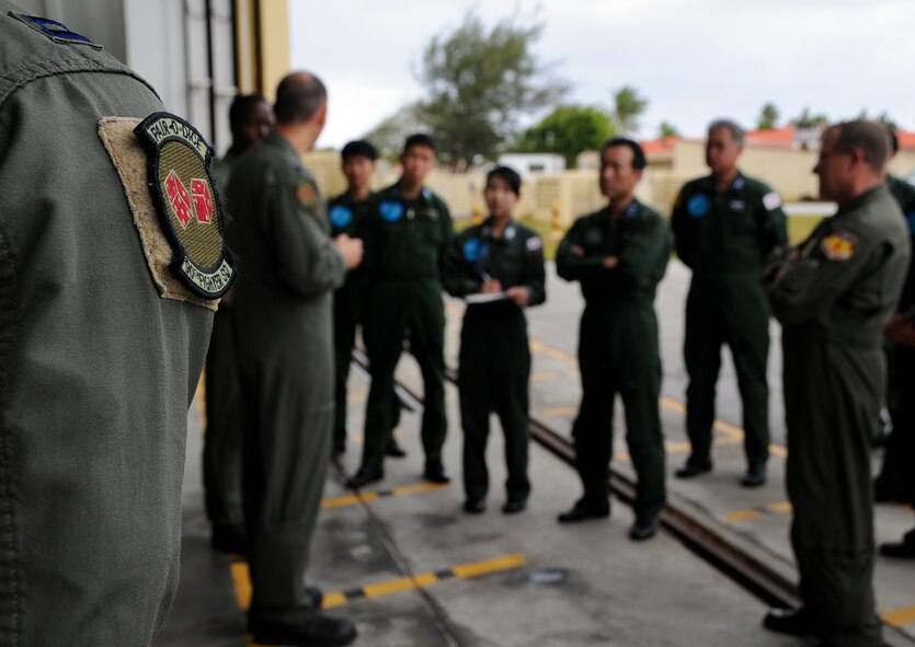 ANDERSEN AIR FORCE BASE, Guam - Lt. Col. Orlando "Slider" Sanchez, 90th Expeditionary Fighter Squadron pilot, briefs Lt. Gen. Edward Rice, United States Forces Japan commander, Maj. Gen. Hideo Wakabayashi, Japan Air Self Defense Force 3rd Air Wing commander, Brig. Gen. Phil Ruhlman, 36th Wing commander, and other JASDF members on the F-22A Raptor during a tour here Feb. 13. The 90th Expeditionary Fighter Squadron is deployed to Andersen from Eielson AFB, Alaska, as a part of the Theater Security Package. The F-22 Raptor is the Air Force's newest fighter aircraft. Its combination of stealth, supercruise, maneuverability, and integrated avionics, coupled with improved supportability, represents an exponential leap in warfighting capabilities.(U.S. Air Force photo by Airman 1st Class Courtney Witt)