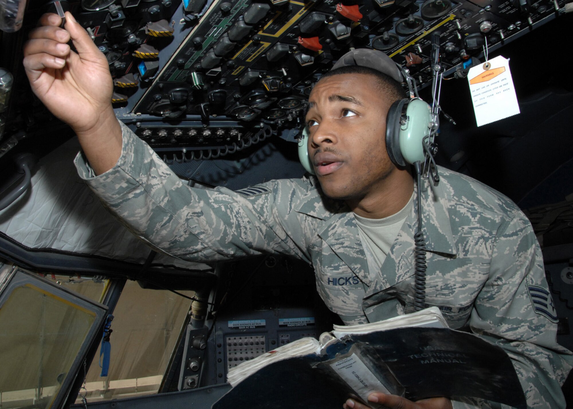 SOUTHWEST ASIA -- Staff Sgt. Korvarsie Hicks, 386th Expeditionary Maintenance Squadron, checks the fuel systems to ensure they are operating correctly according to technical orders at an air base in Southwest Asia, Feb. 12. The fuel control panel is located in the cockpit; it controls the movement of fuel and alerts the aircrew if there are any problems. Sergeant Hicks is deployed from Ramstein Air Base, Germany, and is orginally from Detroit. (U.S. Air Force photo/Senior Airman Courtney Richardson)