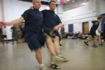 The three-legged race is a staple of field meets and factored into Recruiting Station Milwaukee's annual event. Some teams opted to try their luck with the normal legged walking motion while a couple decided on a method of synchronized hopping. This field meet is an annual event pitting the four metro-Milwaukee recruiting substation against each other in order to foster friendly competition which will prove useful for these poolees throughout their Marine Corps career.