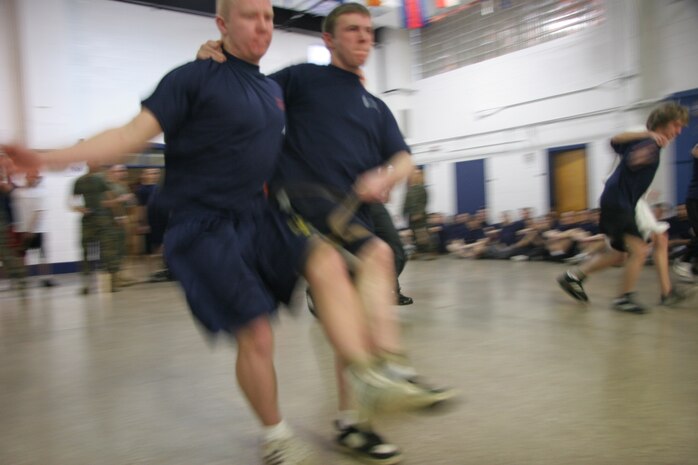 The three-legged race is a staple of field meets and factored into Recruiting Station Milwaukee's annual event. Some teams opted to try their luck with the normal legged walking motion while a couple decided on a method of synchronized hopping. This field meet is an annual event pitting the four metro-Milwaukee recruiting substation against each other in order to foster friendly competition which will prove useful for these poolees throughout their Marine Corps career.