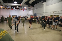 The fireman's carry relay race was just one part of Recruiting Station Milwaukee's annual field meet held at the reserve center here Feb. 14. The field meet fosters friendly competition which will prove beneficial for these poolees throughout their Marine Corps careers.