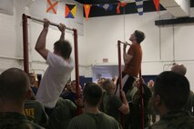 Recruiting Substation Racine dominated the pull up and flexed-arm hang portion of a field meet held at the reserve center here Feb. 14. The annual field meet pits the four metro Milwaukee area substations against each other and fosters friendly competition which will serve the poolees well in their Marine Corps careers.