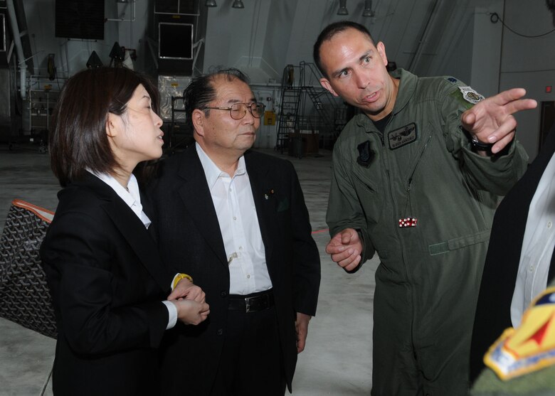 ANDERSEN AIR FORCE BASE, Guam - Lt. Col. Orlando "Slider" Sanchez, 90th Expeditionary Fighter Squadron F-22 Raptor pilot, explains the F-22A Raptor’s capabilities to Seigo Kitamura, Senior Vice Minister of Defense for the Prime Minister of Japan, during a site visit here Feb. 14. During his tour, Mr. Kitamura received a mission briefing about the 36th Wing and the annual Cope North exercise. Cope North 09-1 is a Pacific Command-sponsored exercise designed and developed by 13th Air Force, Detachment 1, to increase combat readiness and interoperability between the U.S. Air Force, Navy, and the Japan Air Self Defense Force in defense of Japan. (U.S. Air Force photo by Senior Airman Nichelle Griffiths)