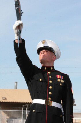 Lance Cpl. Zachery Sturges catches his rifle during the Challenge Day tryout for the U.S. Marine Corps Silent Drill Platoon at Marine Corps Air Stations Yuma, Ariz., Feb. 15.  Sturges was named 'Old Dog' for top second year marcher in the platoon.