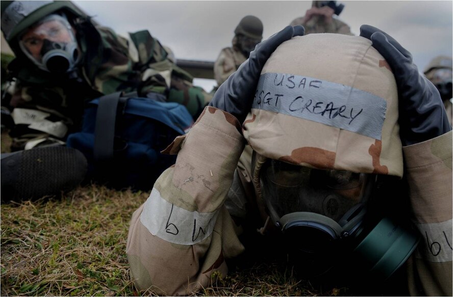 MOODY AIR FORCE BASE, Ga. -- Staff Sgt. Tamika Creary, 23rd Logistics Readiness Squadron, takes cover in a bunker during a simulated enemy attack.  More than 1,300 Moody Airmen participated in the Phase II Operational Readiness Exercise Feb. 9-13 here.  (U.S. Air Force photo by Senior Airman Gina M. Chiaverotti)