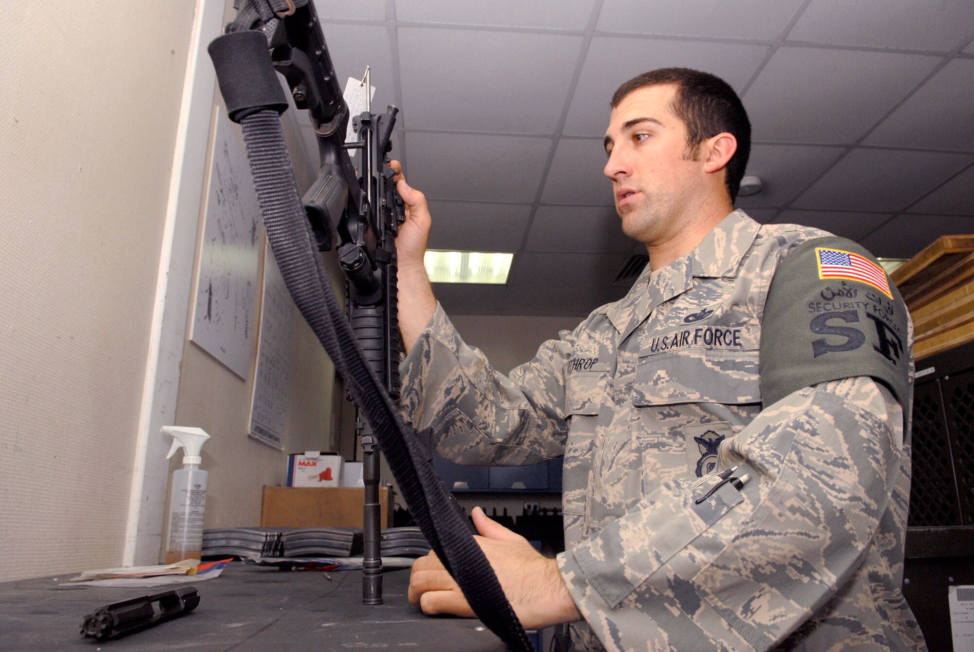 Staff Sergeant Art Lothrop, 379th Expeditionary Security Forces Squadron (ESFS) Combat Arms Training Maintenance (CATM) NCOIC, uses a barrel erosion gauge to inspect for wear and damage on an M4 carbine, Feb. 15, 2009, at an undisclosed location in Southwest Asia.  Team members of CATM, issue, inspect, and maintain weapons held in the armory for the base.  Staff Sgt. Lothrop hails from Colfax, Wash. and is deployed from Tyndall Air Force Base, Fla. and is deployed in support of Operation Iraqi and Enduring Freedom and Combined Joint Task Force - Horn of Africa.  (U.S. Air Force Photo by Airman 1st Class Andrew Satran/Released)