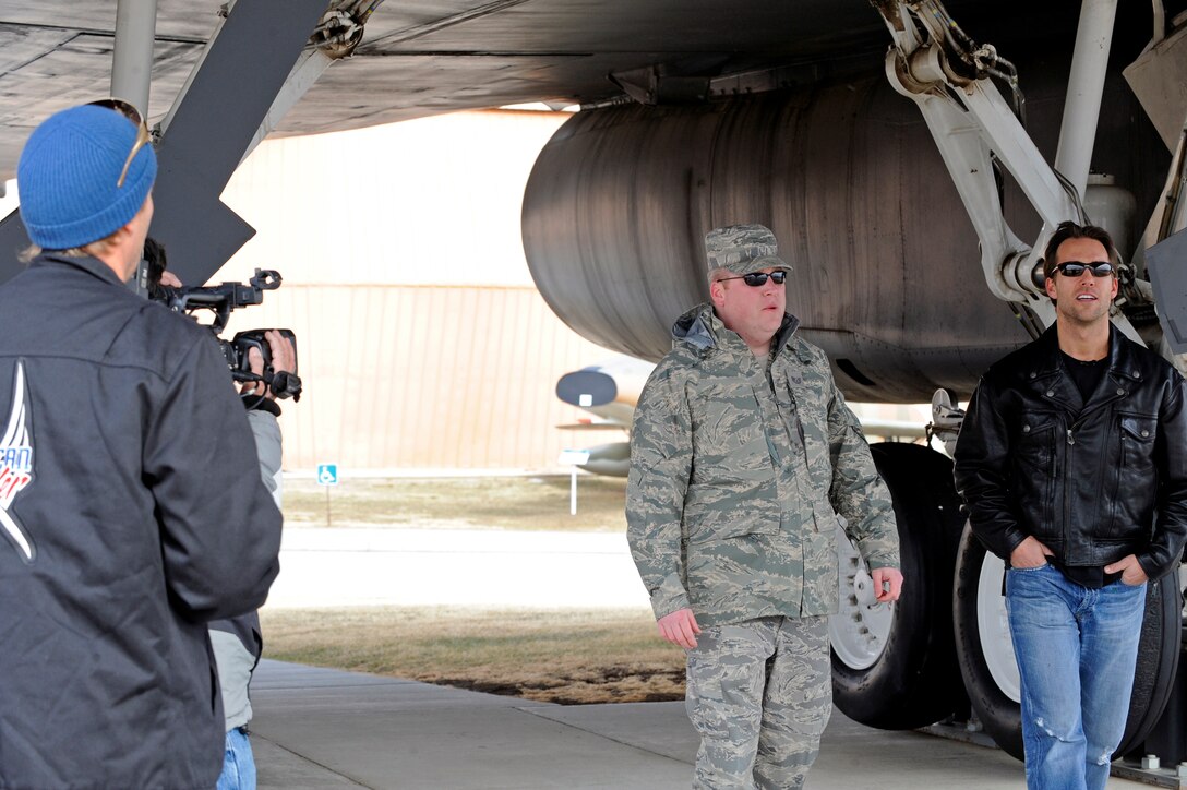 Filming for a segment of an episode of the Speed Channel's "American Thunder" takes place at the South Dakota Air and Space Museum, Feb. 11. Tech. Sgt. Steven Wilson, 28th Bomb Wing Public Affairs NCO in charge, gave Colby Donaldson, host of American Thunder, a tour of various parts of the museum featuring legacy aircraft, nuclear missile exhibits and other historical icons unique to America’s airpower heritage. (U.S. Air Force photo/Airman 1st Class Matthew Flynn)