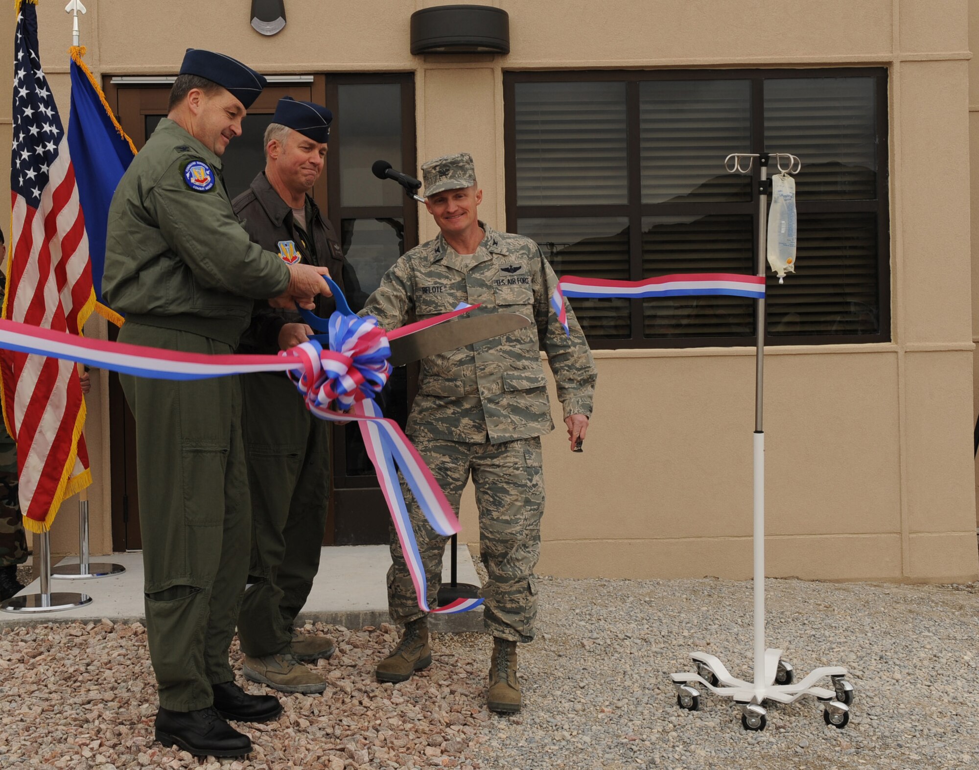 CREECH AFB, Nev. -- Colonel Kory Cornum, Command Surgeon for Air Combat Command, Col. Chris Chambliss 432d Wing and 432d Air Expeditionary Wing commander and Col. David Belote, 99th Air Base Wing commander, officially open the new medical and dental facilities at Creech Air Force Base Feb. 12. The Creech Medical Aid Station is the first permanent medical facility to be established since the activation of the 432d Wing, which is the largest tenant unit on Creech AFB, in May 2007. (U.S. Air Force Photo / Airman 1st Class Stephanie Rubi)