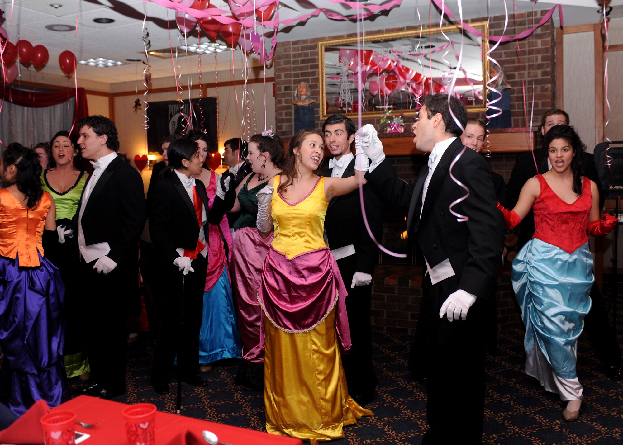 CANNON AIR FORCE BASE N.M.-- Students from the Eastern New Mexico University Operata sing Happy Birthday at the Quarterly Birthday Meal at the Pecos Trail Dining facility Feb.12. The students performed musical acts for the Airmen celebrating their birthday. (U.S. Air Force photo by Airman 1st Class Evelyn Chavez)  