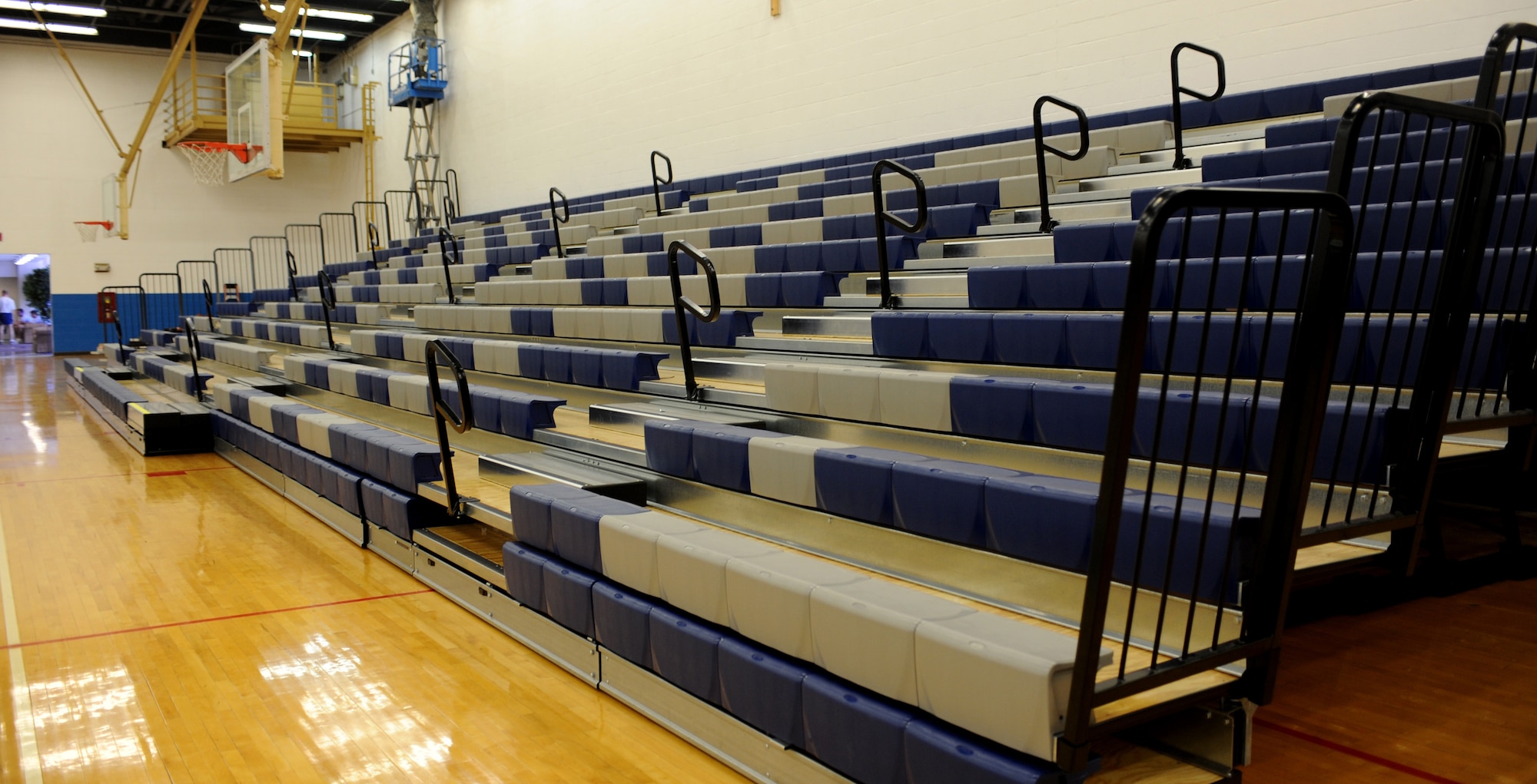 CANNON AIR FORCE BASE, N.M. - New Fitness Center bleachers are pulled out for a base basketball game Feb. 5. The base has spent more than $231,000 on improvements at the fitness center. These improvements include new treadmills, LCD televisions, bleachers, toys for the family fitness room, mats, and cycling bikes. The facility is also projected to receive an additional $80,000 to replace more of the older equipment. (U.S. Air Force photo/Airman 1st Class Evelyn Chavez) 