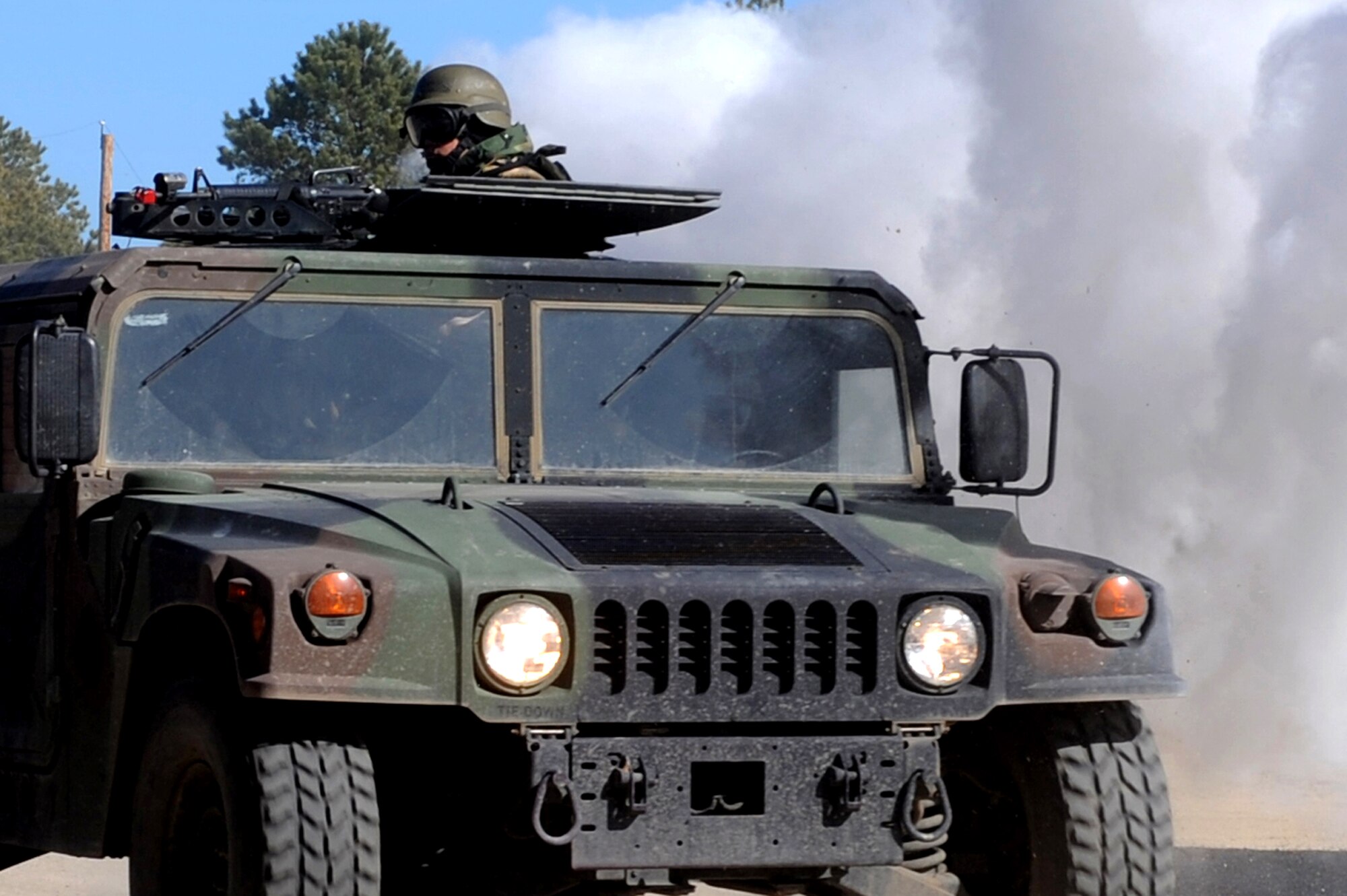 A student in the Air Force Advanced Contingency Skills Training Course reacts to a scenario during convoy operations training on Feb. 17, 2009, at a range on Fort Dix, N.J.  The course is taught by the U.S. Air Force Expeditionary Center's 421st Combat Training Squadron, also at Fort Dix.  The course prepares Airmen for upcoming deployments through training in everything from convoy operations and combat first aid to patrolling and tactics.  (U.S. Air Force Photo/Staff Sgt. Nathan Bevier)