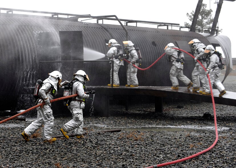 MOODY AIR FORCE BASE, Ga. -- Members from the 23rd Civil Engineer Squadron fire department respond to a simulated HC-130P Combat King aircraft crash during the Phase II Operational Readiness Exercise Feb. 9-13 here. (U.S. Air Force photo by Senior Airman Brittany Barker) 