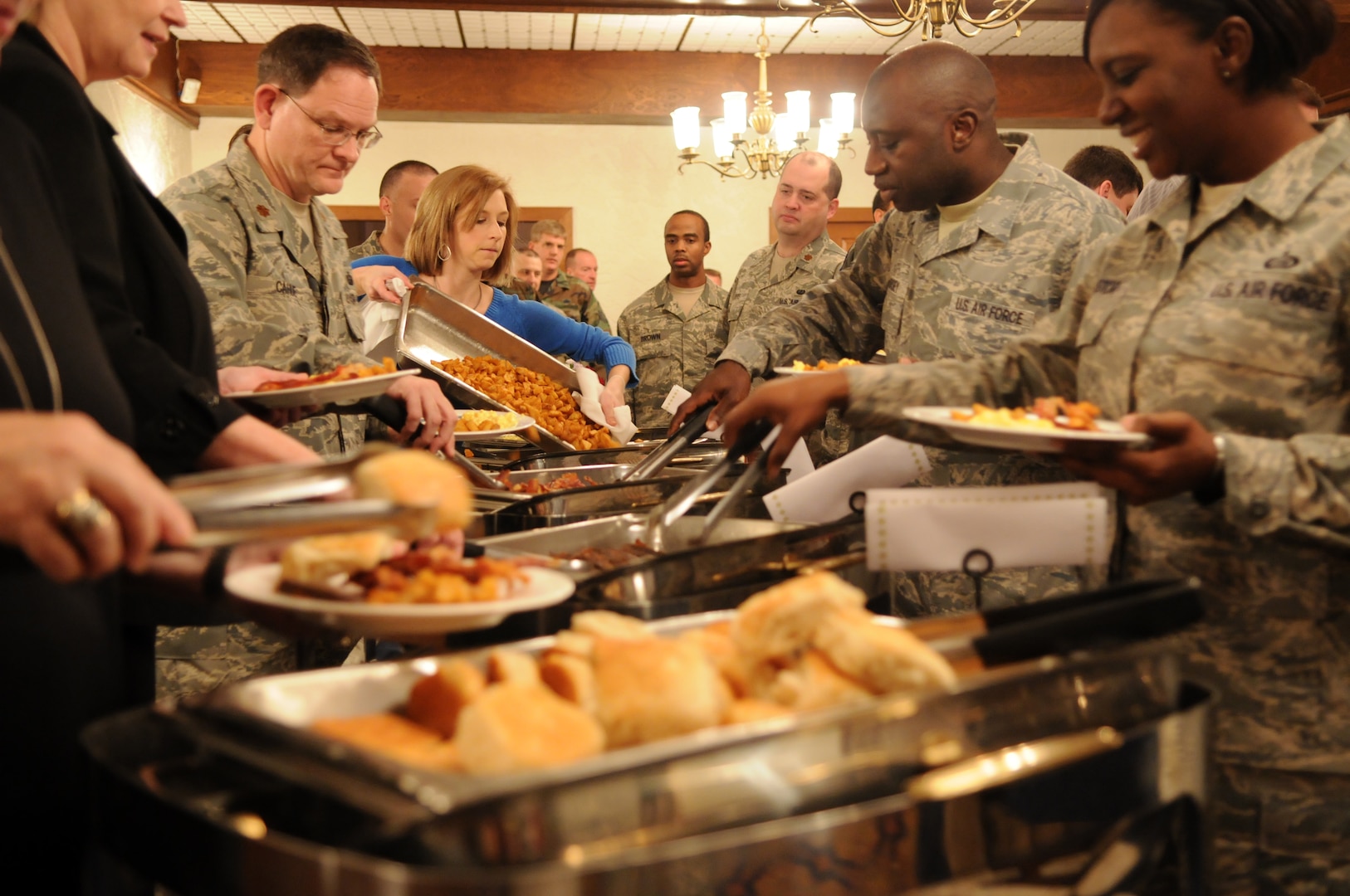 Airmen and defense department civilians help themselves to a buffet breakfast during the 2009 National Prayer Breakfast at the Parr Club on Feb. 17. (U.S. Air Force photo by Rich McFadden)