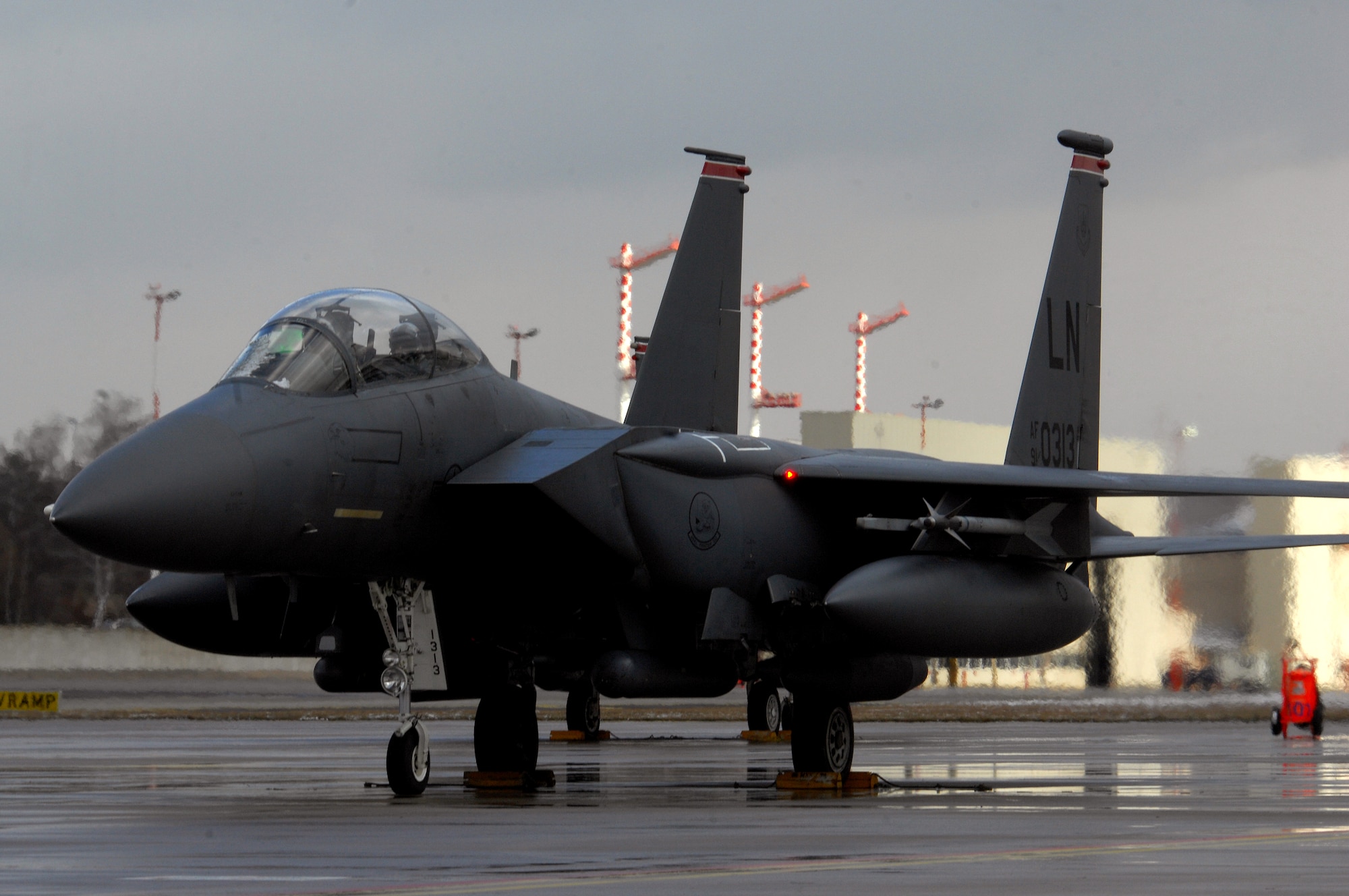 An F-15E Strike Eagle from Royal Air Force Lakenheath, England, waits for chalks to be pulled prior to take-off Feb. 12, 2009, at Ramstein Air Base. (U.S. Air Force photo by Airman 1st Class Kenny Holston) 