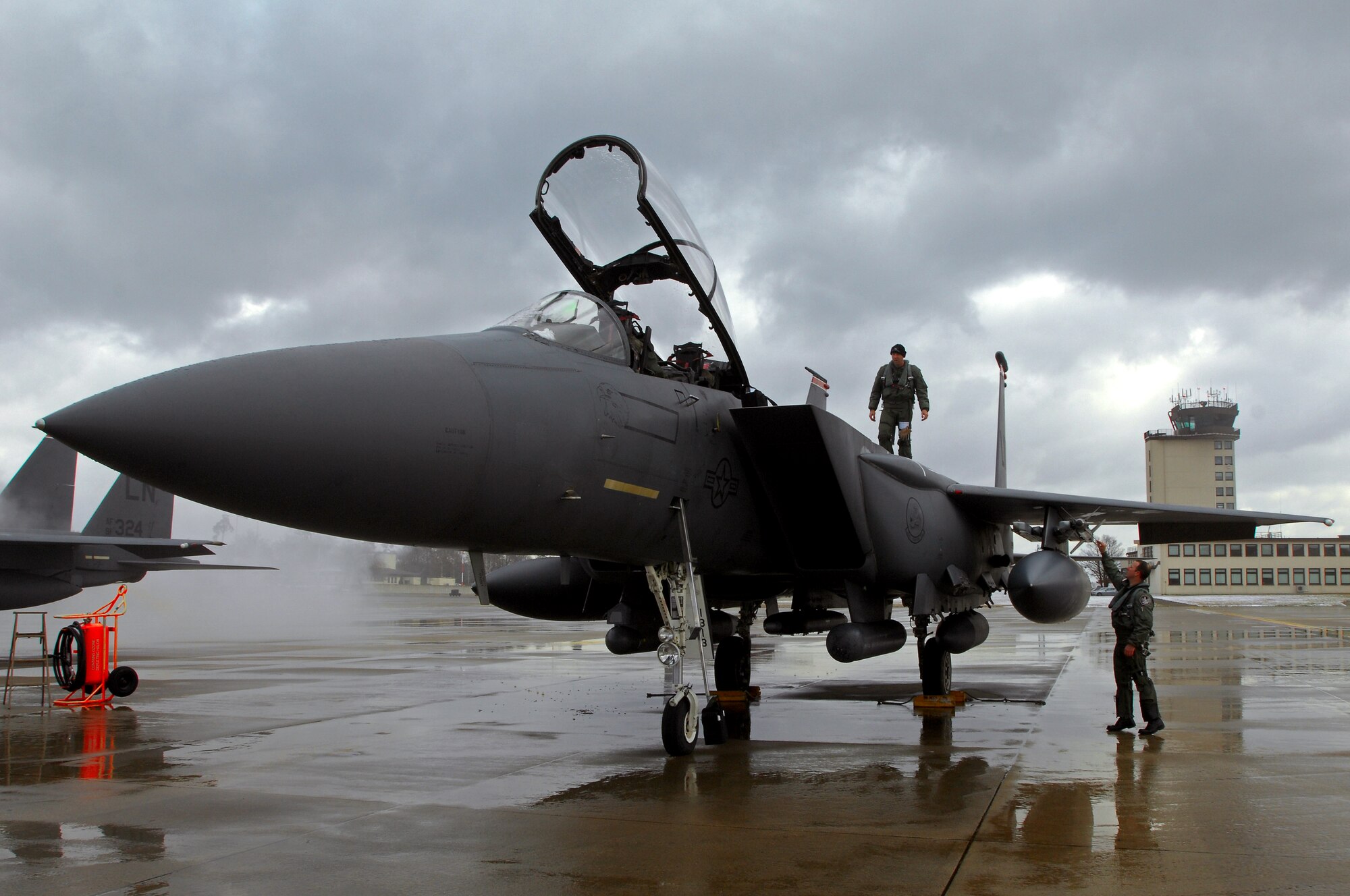 F-15E Strike Eagle pilots from Royal Air Force Lakenheath, England, perform pre-flight checks prior to take-off Feb. 12, 2009, at Ramstein Air Base. (U.S. Air Force photo by Airman 1st Class Kenny Holston)