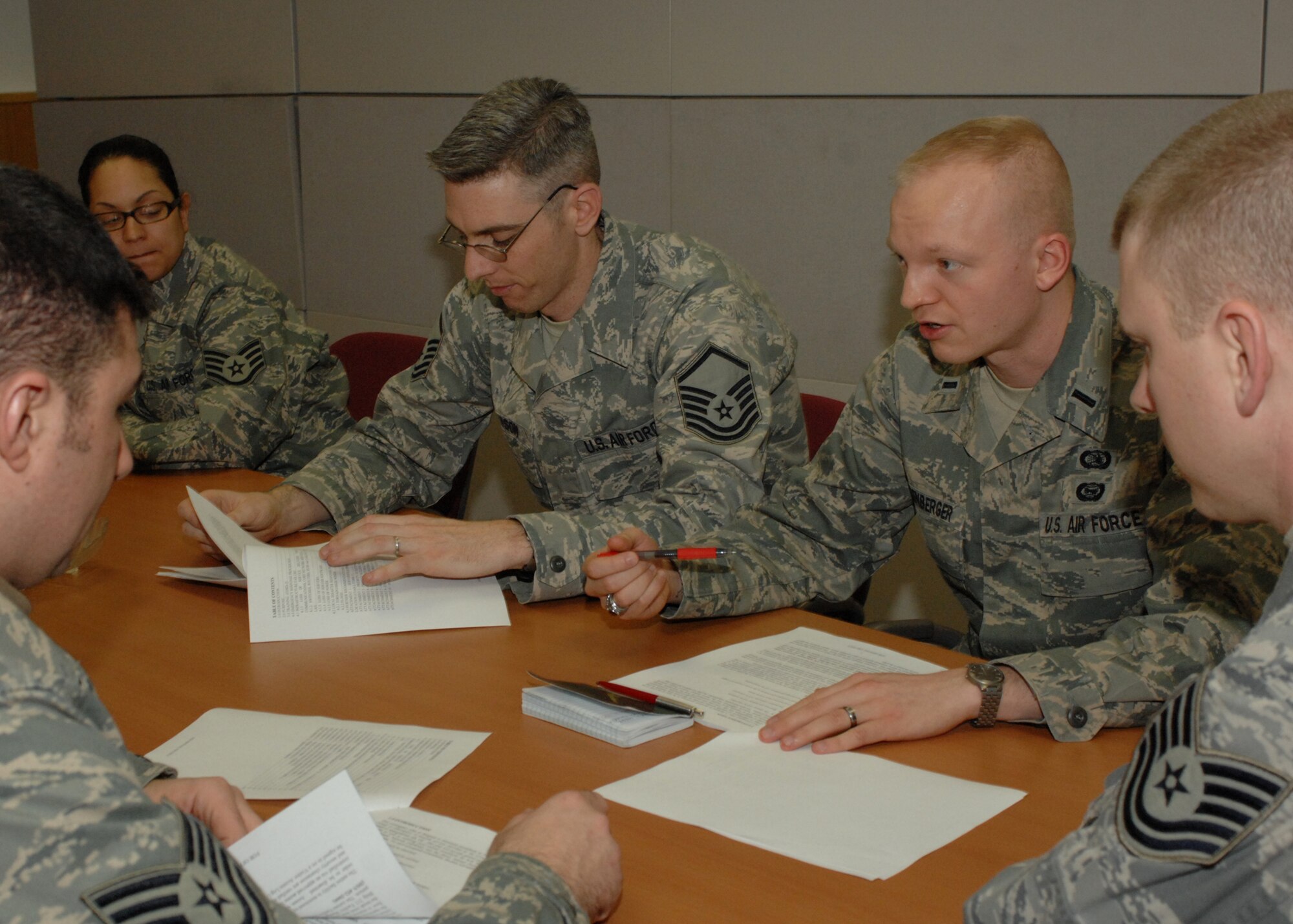 SPANGDAHLEM AIR BASE, Germany -- 1st Lt. David Smalenberger, 52nd Communications Squadron, briefs members of the 52nd CS about Unit Compliance Inspection Feb. 13, 2009.  Members from across the 52nd Fighter Wing are doing final preparation for the inspection, scheduled from Feb. 23- 27, 2009. (U.S. Air Force photo by Senior Airman Jenifer H. Calhoun)