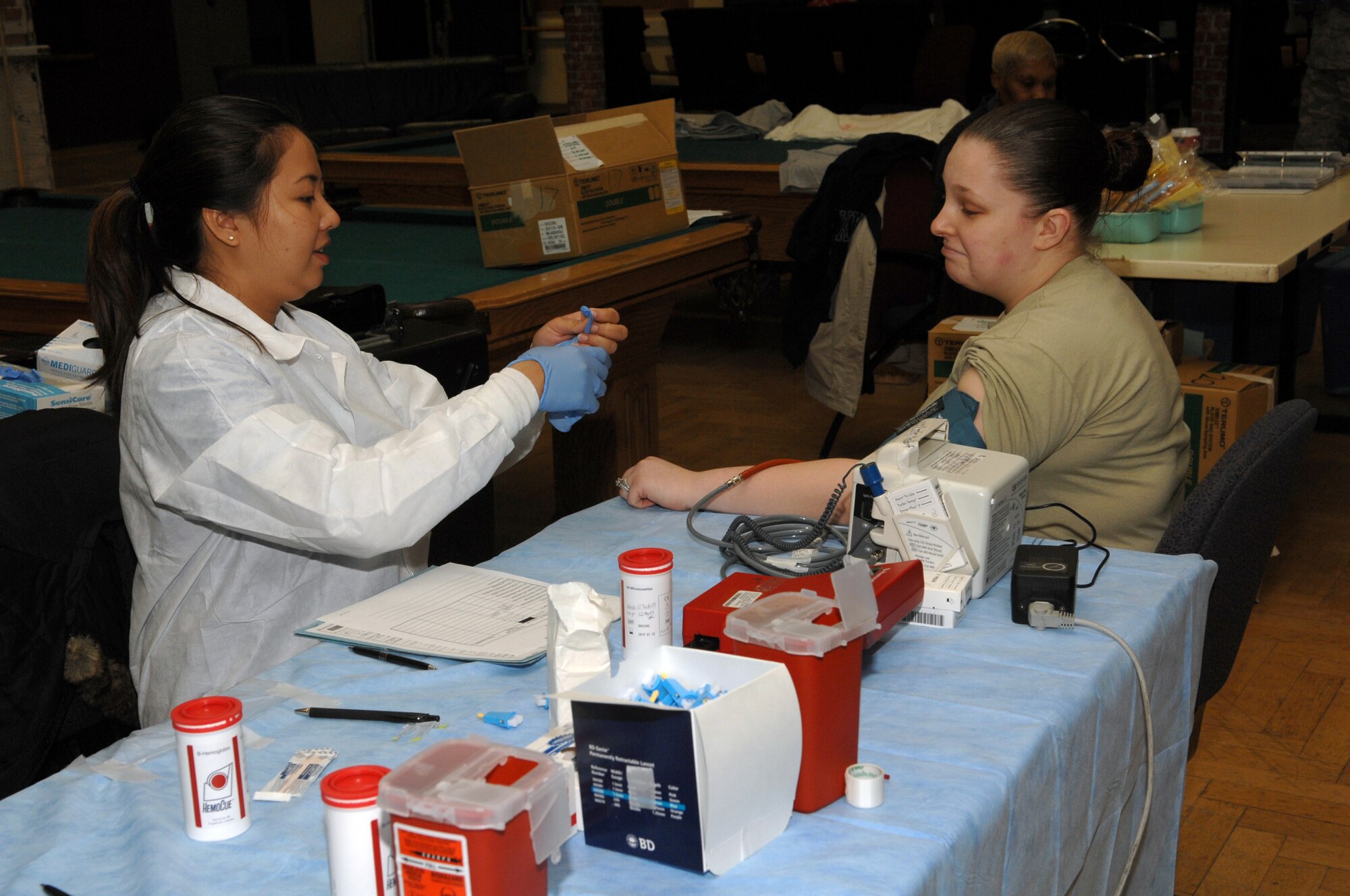 SPANGDAHLEM AIR BASE, Germany -- Senior Airman Michelle Thomas, 52nd Medical Group, prepares to donate blood for the Armed Forces Blood Drive Feb. 11, 2009.  The donated blood helps servicemembers who were injured in combat.  (U.S. Air Force Photo by Senior Airman Allen Pollard)