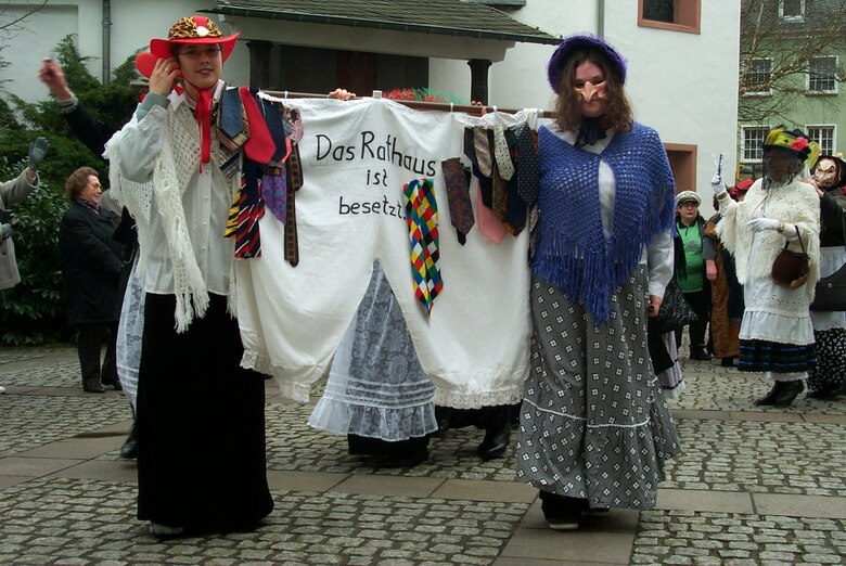 COLOGNE, Germany – Women participate in fasching festivities. In accordance with tradition, women cut the ties of men taken captive during the Weiberdonnerstag party, taking away their power for the day. Fasching, a five-day festival, is held from Thursday through Tuesday each year prior to Ash Wednesday. (U.S. Air Force photo/Iris Reiff)