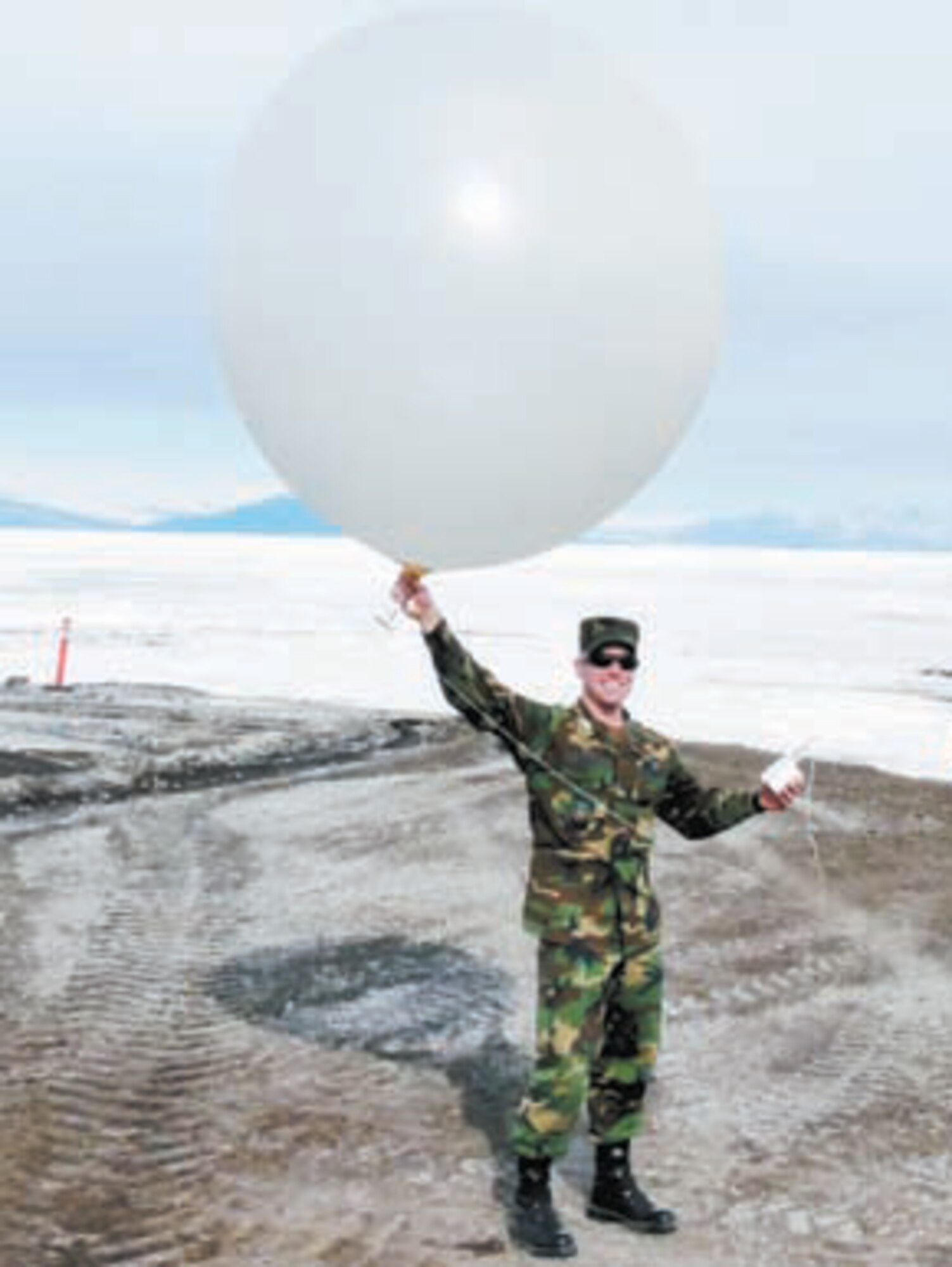 McMURDO STATION, Antarctica -- Air Force Academy Cadet 1st Class Patrick Warfel launches a weather balloon during his visit to the South Pole in December. (Courtesy photo)