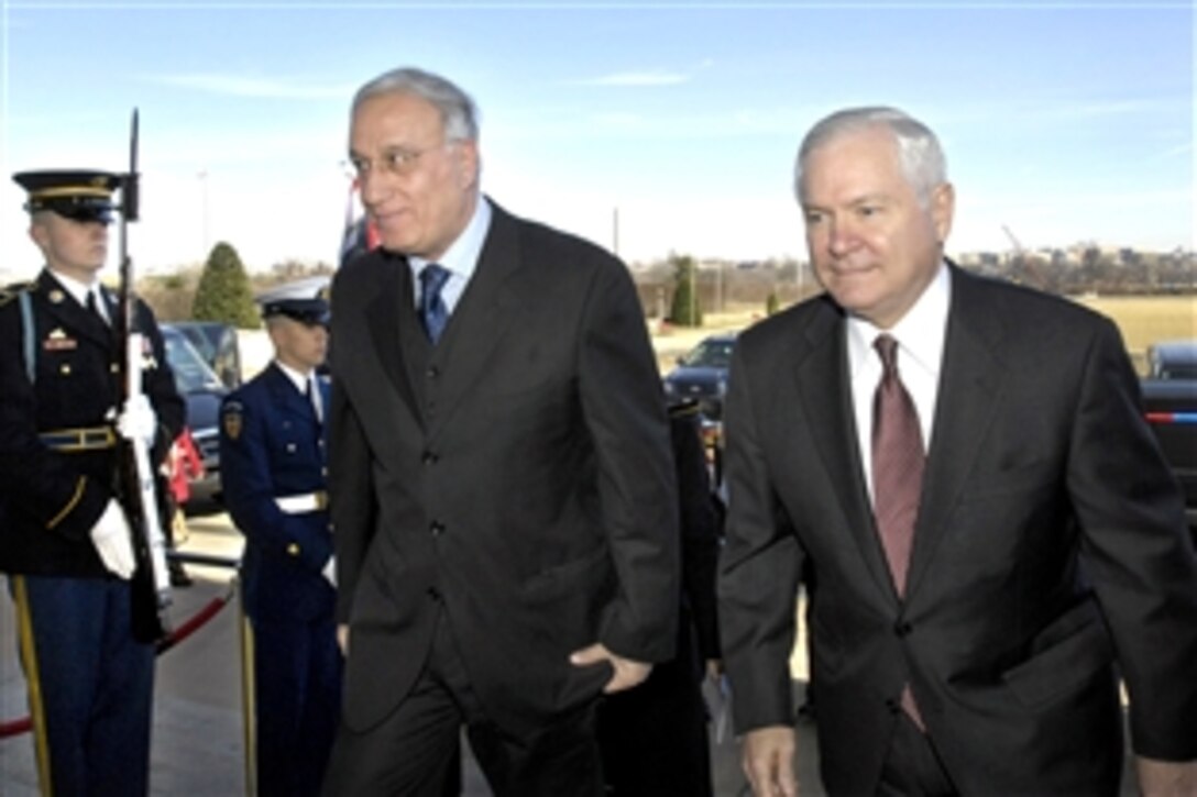 Defense Secretary Robert M. Gates, right, escorts Iraqi Minister of Defense Abd al-Qadir Al-Mufriji into the Pentagon to discuss bilateral security issues, Feb. 17, 2009. 