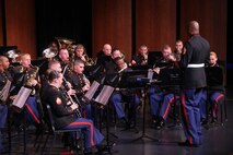 Staff Sgt. Joey A. Payton, enlisted conductor, Marine Band San Diego, leads the band during one of its sets at Prior Lake High School. Fifty members of the U.S. Marine Corps Band San Diego recently performed at several high schools in the Twin Cities area as part of its annual tour.