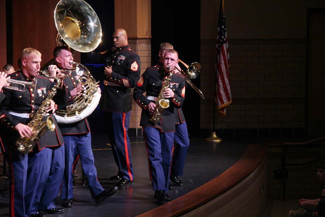 Sgt. James Holt, a musician with Marine Band San Diego, looks down the line of the Party Band as he blasts away with his saxophone during its recent performance at Prior Lake High School. Fifty members of the U.S. Marine Corps Band San Diego recently performed at several high schools in the Twin Cities area as part of its annual tour.