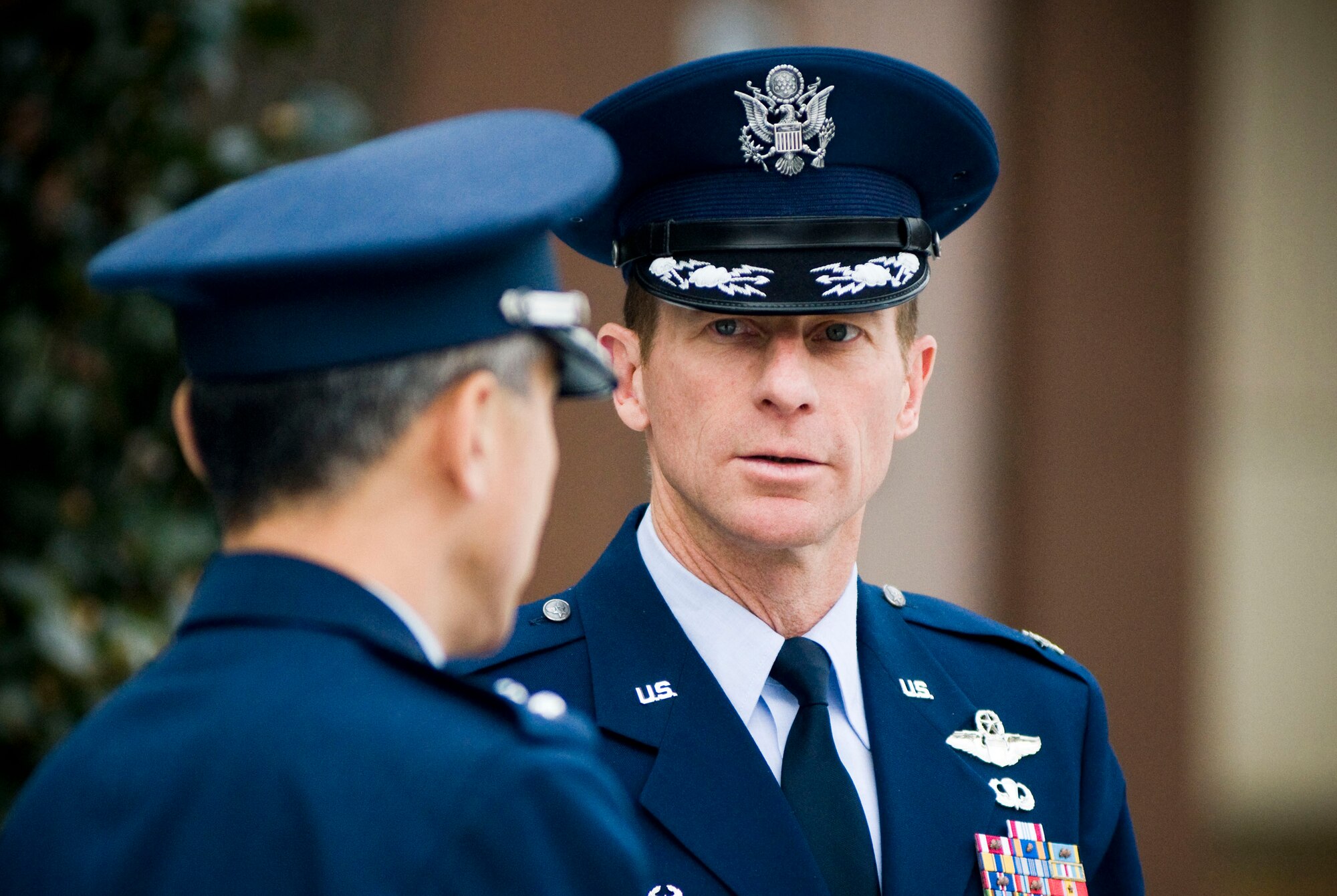MISAWA AIR BASE, Japan -- Col. David Stilwell (right), 35th Fighter Wing commander, and Japan Air Self-Defense Force Maj. Gen. Hiroaki Maehara, 3rd Air Wing commander, talk together outside following a luncheon with local mayors at the JASDF dining facility, Feb. 10, 2009. With an almost equal population of American and Japanese forces on Misawa Air Base, this sort of dialogue goes a long way in strengthening international relations. (U.S. Air Force photo by Staff Sgt. Samuel Morse)