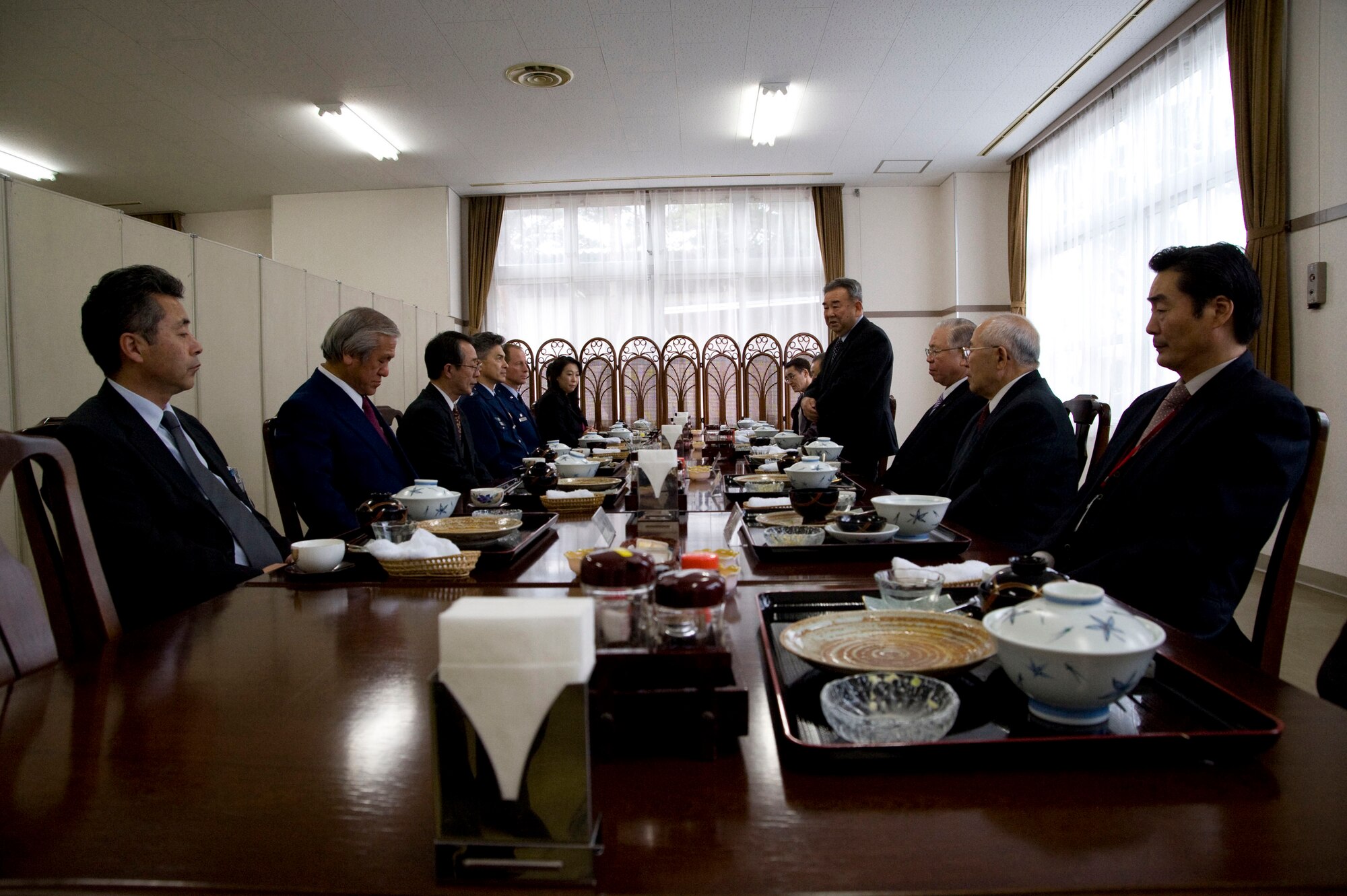 MISAWA AIR BASE, Japan -- Mayor Kazumasa Taneichi, Misawa City mayor, delivers closing comments following a luncheon in the Japan Air Self-Defense Force dining facility Feb. 10, 2009. Japanese mayors have a considerable amount of power and influence in their respective districts, making this sort of meeting even more important. (U.S. Air Force photo by Staff Sgt. Samuel Morse) 