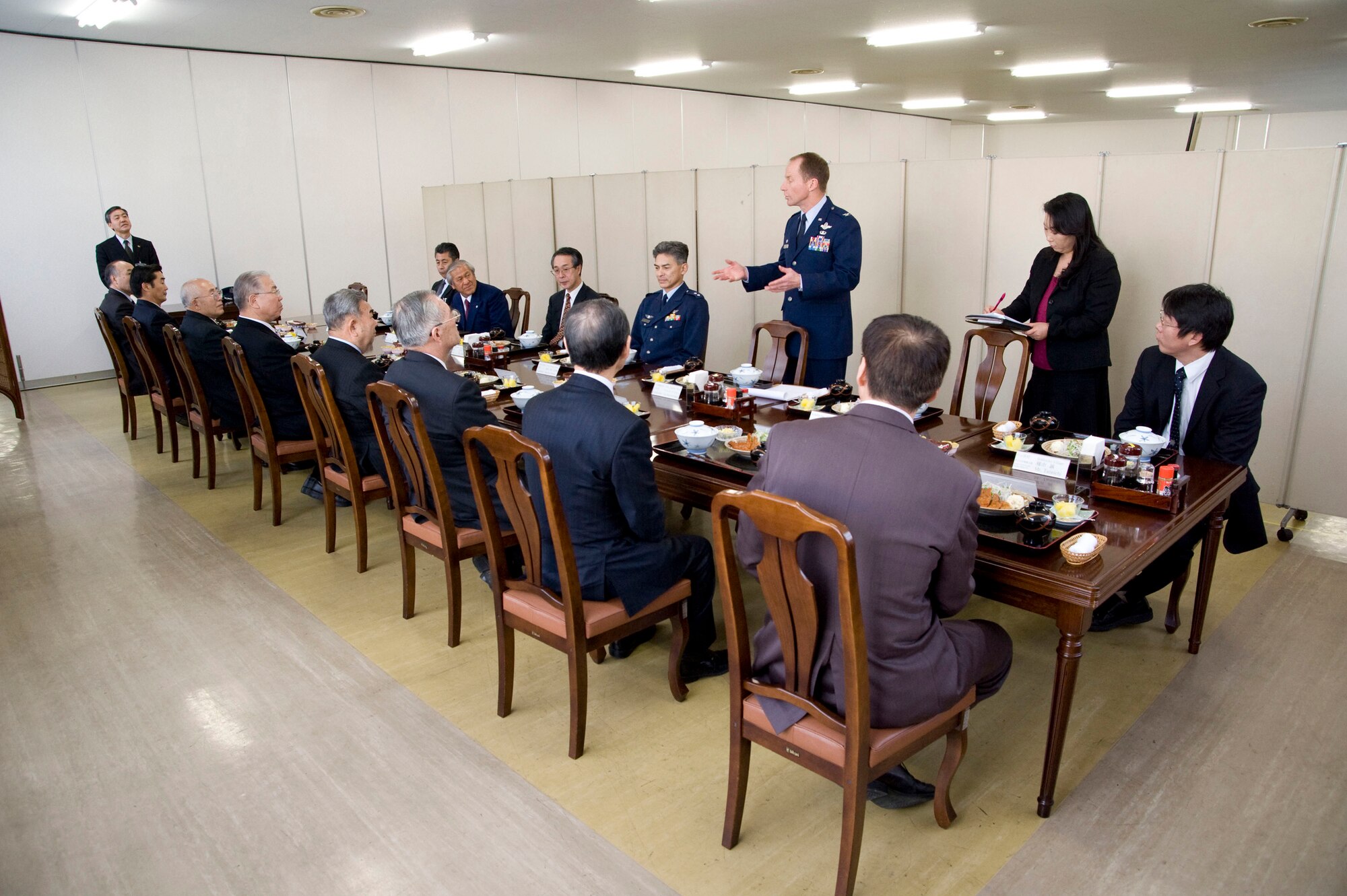 MISAWA AIR BASE, Japan -- Col. David Stilwell, 35th Fighter Wing commander, delivers opening comments for a community luncheon in the Japan Air Self-Defense Force dining facility Feb. 10, 2009. Colonel Stilwell took the extra effort to learn much of his speech in Japanese to avoid relying entirely on his translator, Kyoko Hasegawa. (U.S. Air Force photo by Staff Sgt. Samuel Morse)