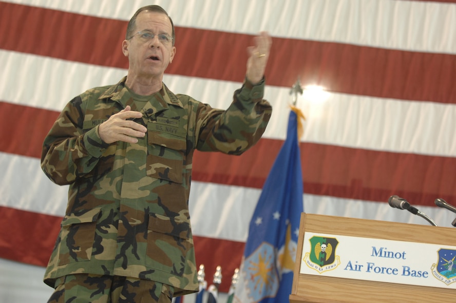 MINOT AIR FORCE BASE, N.D. -- Navy Adm. Michael G. Mullen, chairman of the Joint Chiefs of Staff, addresses more than 1000 Airmen during an all-call at Dock 1 here Feb. 18. During the event, Admiral Mullen talked with Airmen about the importance of family support, concerns over the economic crisis and Minot AFB’s role in nuclear deterrence as the Air Force’s only dual-wing, nuclear-capable base. Admiral Mullen is the first CJCS to visit the base in more than 20 years. (U.S. Air Force photo by Staff Sgt. Stacy Moless)