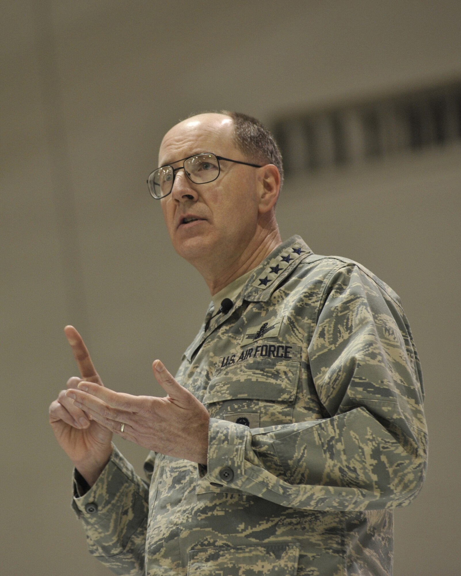 Gen. C. Robert Kehler, Air Force Space Command commander, addresses the members of the 341st Missile Wing during an all-call Feb. 17 in the 3-Bay Hangar. (U.S. Air Force photo/John Turner)