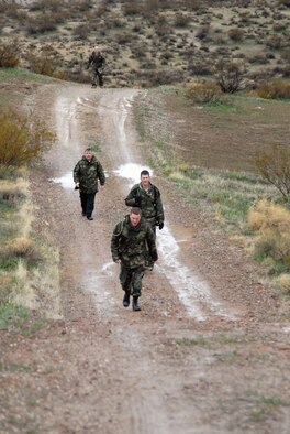 Airmen with the 95th Security Forces Squadron climb Red Hill during the 2nd Joyner Invitational Feb. 16. The 95th SFS hosted the march that started at the West Gate to the top of the hill. (Air Force photo by Senior Airman Julius Delos Reyes)