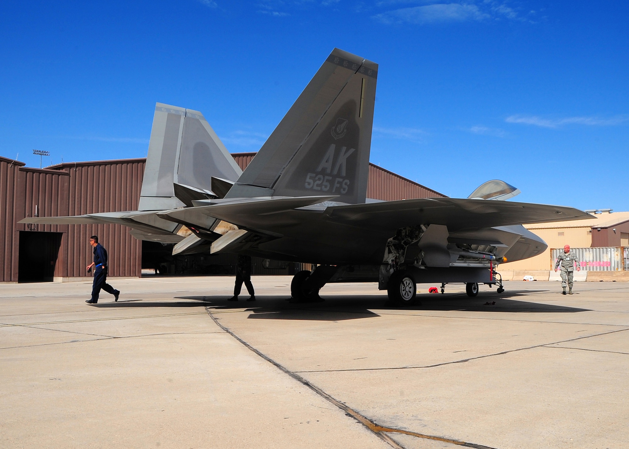 An F-22 Raptor from Elmendorf Air Force Base, Alaska beds down at Holloman Air Force Base, N.M. Feb. 17. Fourteen Raptors will stay at Holloman until the volcanic activity observed at Mount Redoubt near Elmendorf AFB subsides. (U.S. Air Force photo/TSgt Chris Flahive)