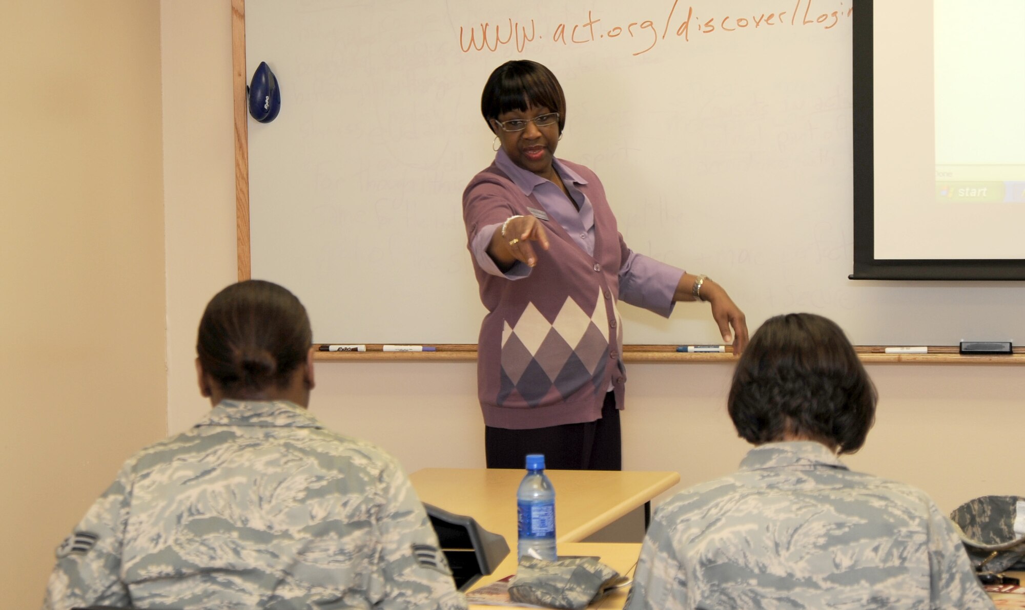 MCCONNELL AIR FORCE BASE, Kan. -- Carolyn Hathaway, 22nd Force Support Squadron, instructs Airmen on the Discover program at the Robert J. Dole Community Center, Feb. 11. The Discover program is a comprehensive computer based system which assists users in career planning through skill identification, knowledge, values and talents. (Photo by Senior Airman Roy Lynch) 