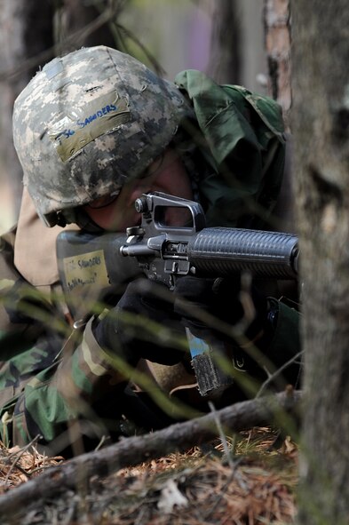 A student in the Advanced Contingency Skills Training Course participates in a scenario for combat first aid training on Feb. 10, 2009, on a Fort Dix, N.J., range.  The course, taught by the U.S. Air Force Expeditionary Center's 421st Combat Training Squadron, prepares Airmen for upcoming deployments through training in everything from combat first aid and convoy operations to patrolling and tactics.  (U.S. Air Force Photo/Staff Sgt. Nathan G. Bevier)