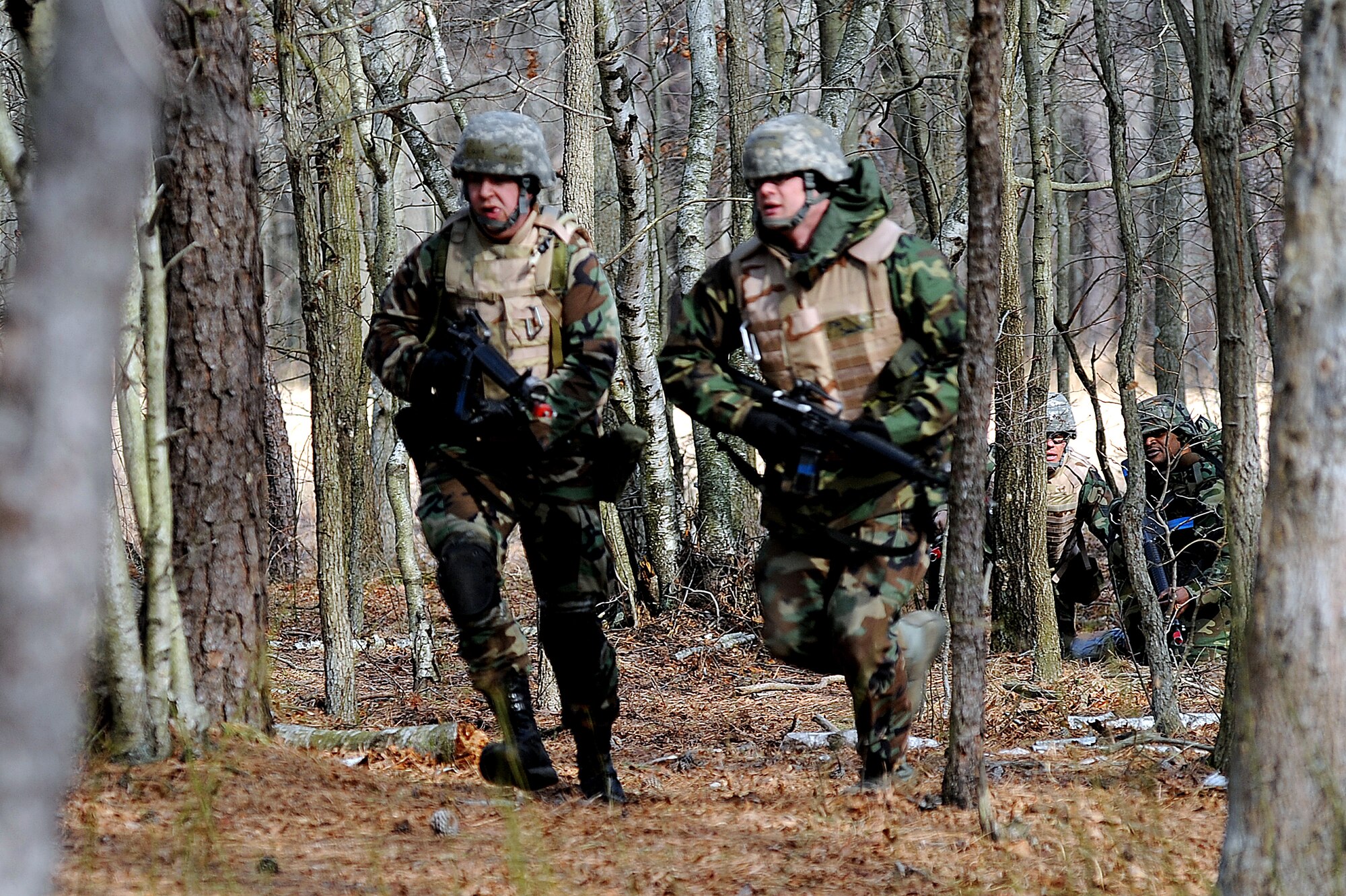 Students in the Advanced Contingency Skills Training Course participate in a scenario for combat first aid training on Feb. 10, 2009, on a Fort Dix, N.J., range.  The course, taught by the U.S. Air Force Expeditionary Center's 421st Combat Training Squadron, prepares Airmen for upcoming deployments through training in everything from combat first aid and convoy operations to patrolling and tactics.  (U.S. Air Force Photo/Staff Sgt. Nathan G. Bevier)