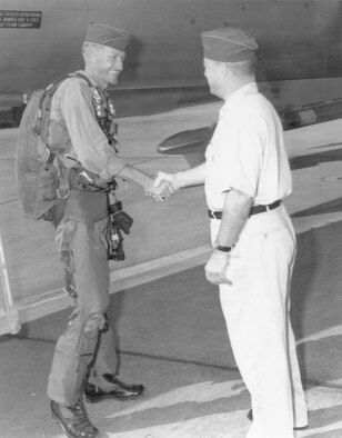 Upon landing, Captains Totten and Bowthorpe were met by Gen. Hunter Harris, Pacific Air Forces commander. Bowthorpe is wearing the flight suit, g-suit, and cap on display.