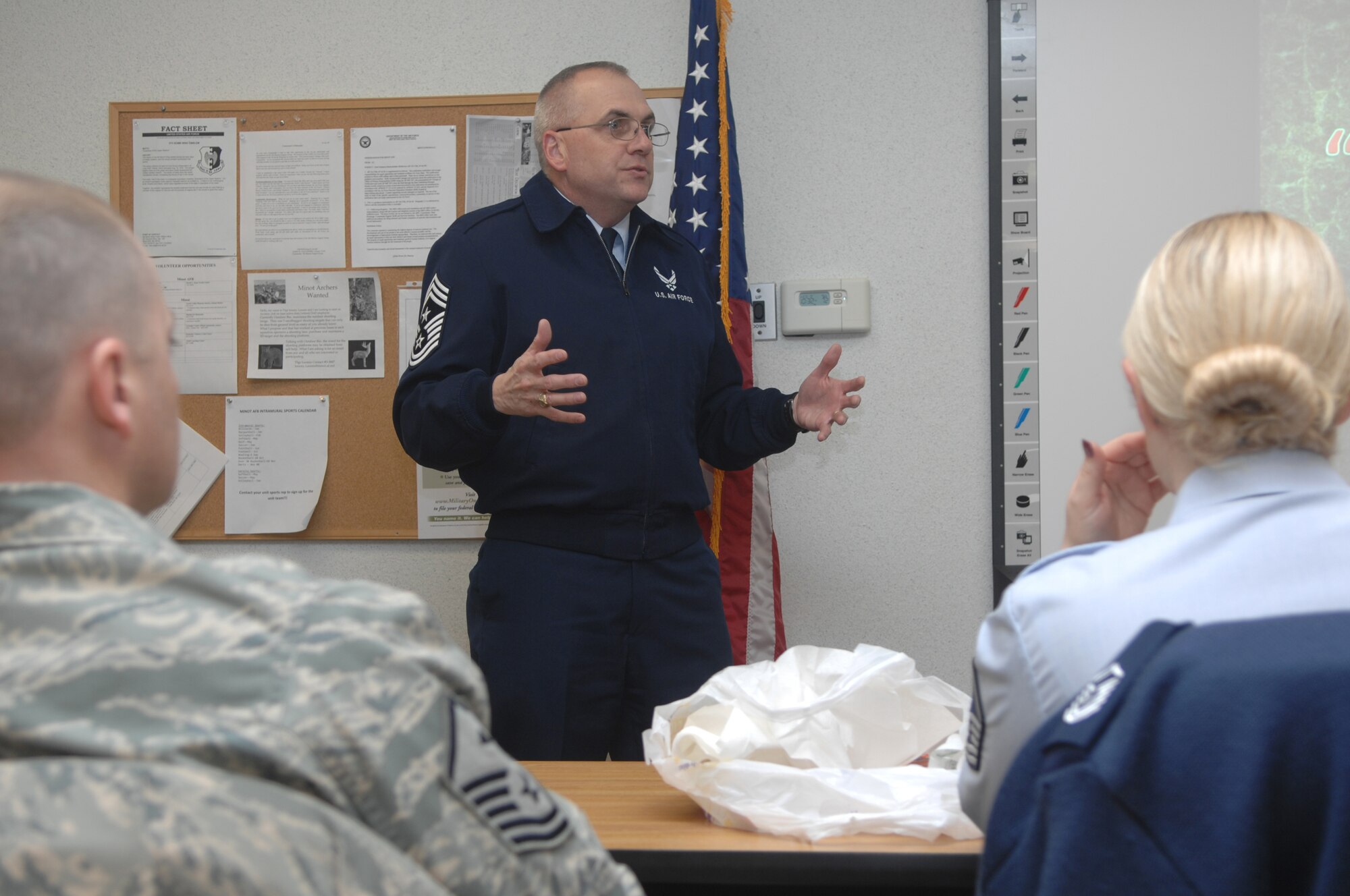 MINOT AIR FORCE BASE, N.D. -- Chief Master Sgt. Mark Clark, 5th Bomb Wing command chief, takes time from his day to speak a group of Airmen attending at the Airmen Professional Development Center here recently. Chief Clark discussed the qualities of followership and how the traits of a good follower can, in turn, make one a good leader. (US Air Force photo by: SSgt Stacy Moless)