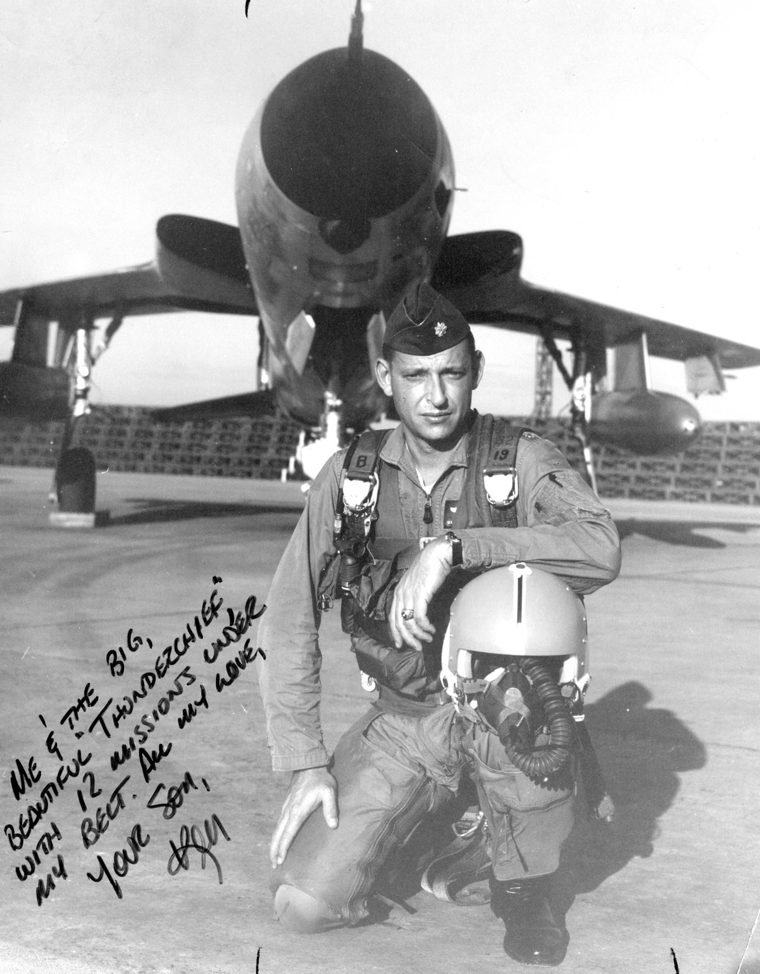 Ken Bell standing in front of an F-105. (U.S. Air Force photo)