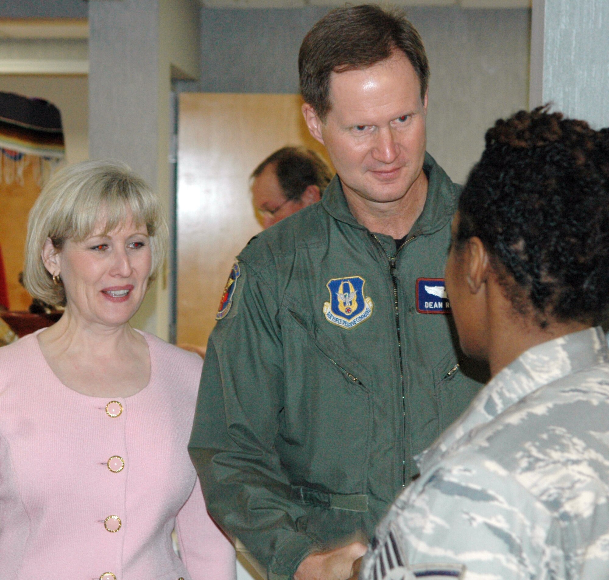 Col. Dean Robinson and his wife Beth in a receiving line following to the 917th Medical Squadron change of command where he assumed command on Feb. 7, 2009 at Hoban Hall, Barksdale AFB, La. (U.S. Air Force photo/Master Sgt. Mary Hinson)