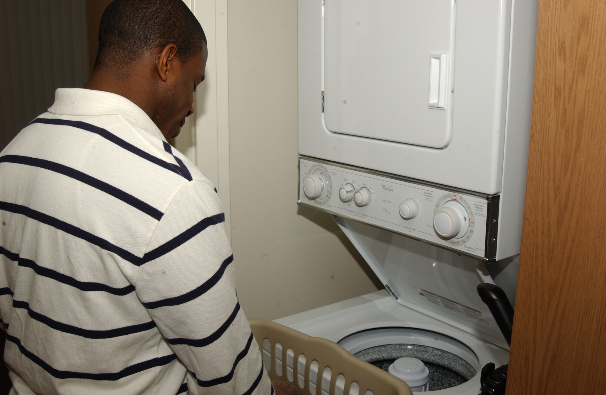 SCOTT AIR FORCE BASE, Ill. -- The other dormitories have one laundry room for the entire residence, but Shiloh Hall has a washer and dryer available in each dorm. Residents benefit from this because it allows for more privacy and makes the dorms feel more like a home.(U.S. Air Force photo/Airman 1st Class Amber Kelly-Woodward)
 
