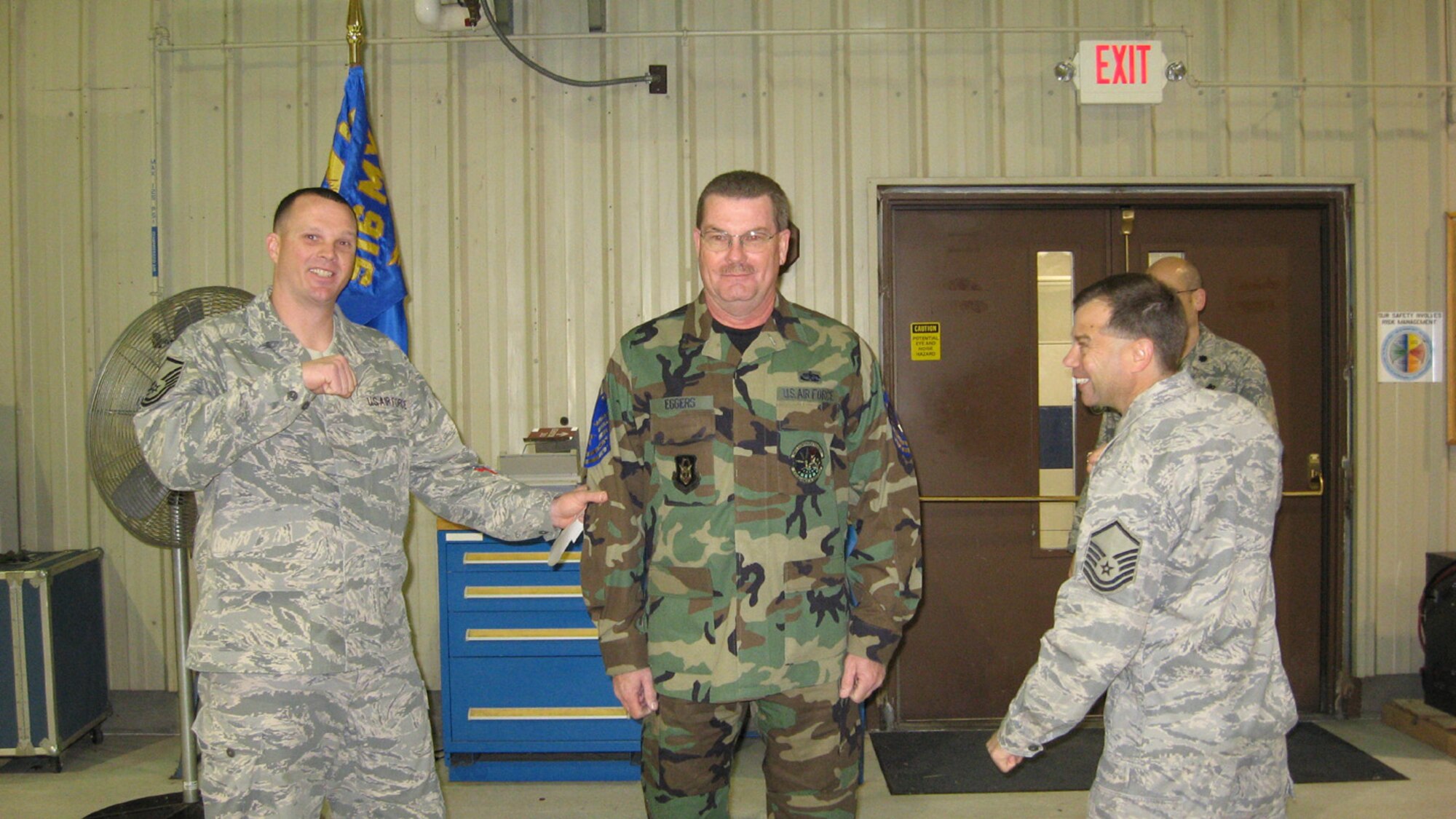 SEYMOUR JOHNSON AIR FORCE BASE, N.C. -- Reservist Robert Eggers (center) was promoted to the rank of master sergeant by Master Sgts. Gary Tumminia and Luke Hoskins during the January drill weekend. Sgt. Eggers is a fuel systems technician with the 916th Maintenance Group.