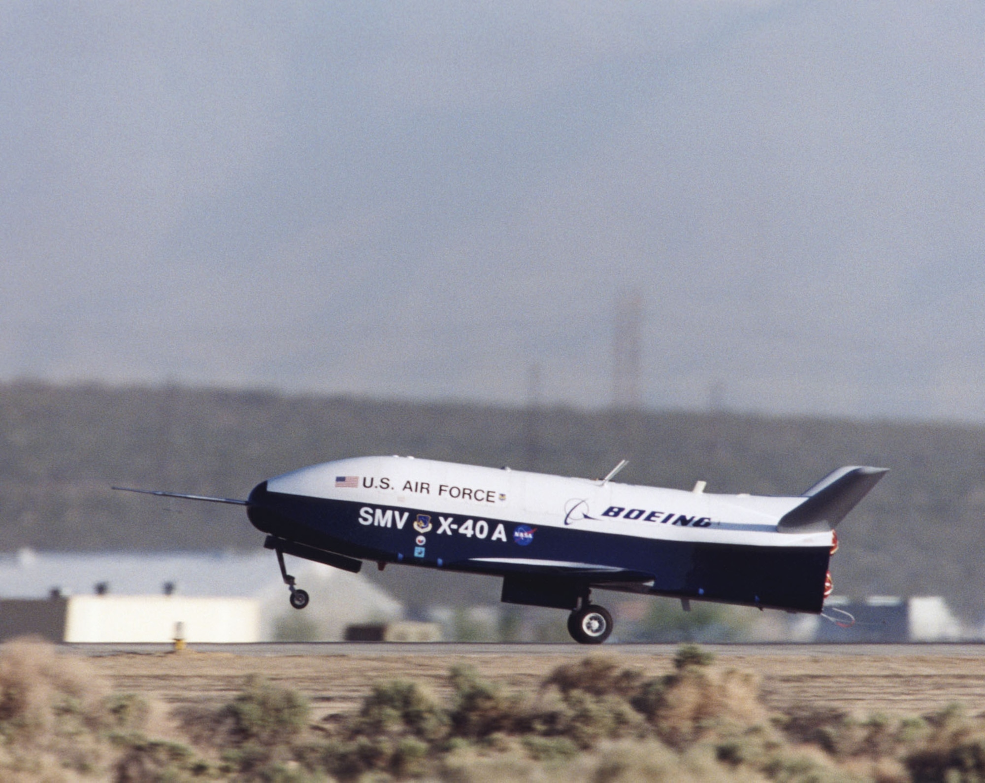 X-40A landing after a free-fall flight. (Photo courtesy of NASA)