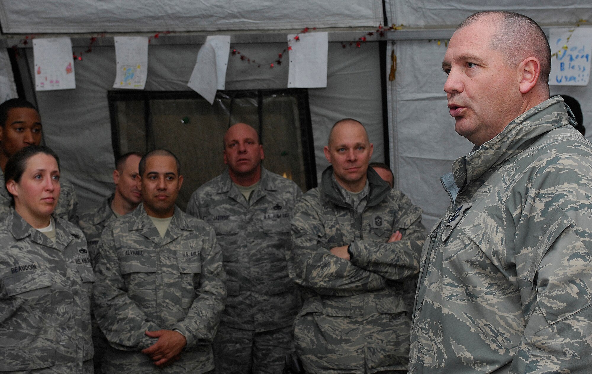 (Right) Chief Master Sgt. Scott Dearduff, 9th Air Force and U.S. Air Forces Central Command Chief Master Sergeant, thanks Airmen from the 75th Expeditionary Fighter Squadron during a site visit to Bagram Air Field, Afghanistan, Feb. 17. Chief Dearduff traveled along with Lt. Gen. Gary North, 9th Air Force and U.S. Air Forces Central commander, and retired Lt. Gen. Eugene Santarelli, an Air Force senior mentor, to speak with Bagram Airmen about some of the challenges they will face in the coming months and thank Airmen who are nearing the end of their deployment rotation for their contribution to Operation Enduring Freedom and the Global War on Terrorism. (U.S. Air Force photo by Staff Sgt. Jason Lake)