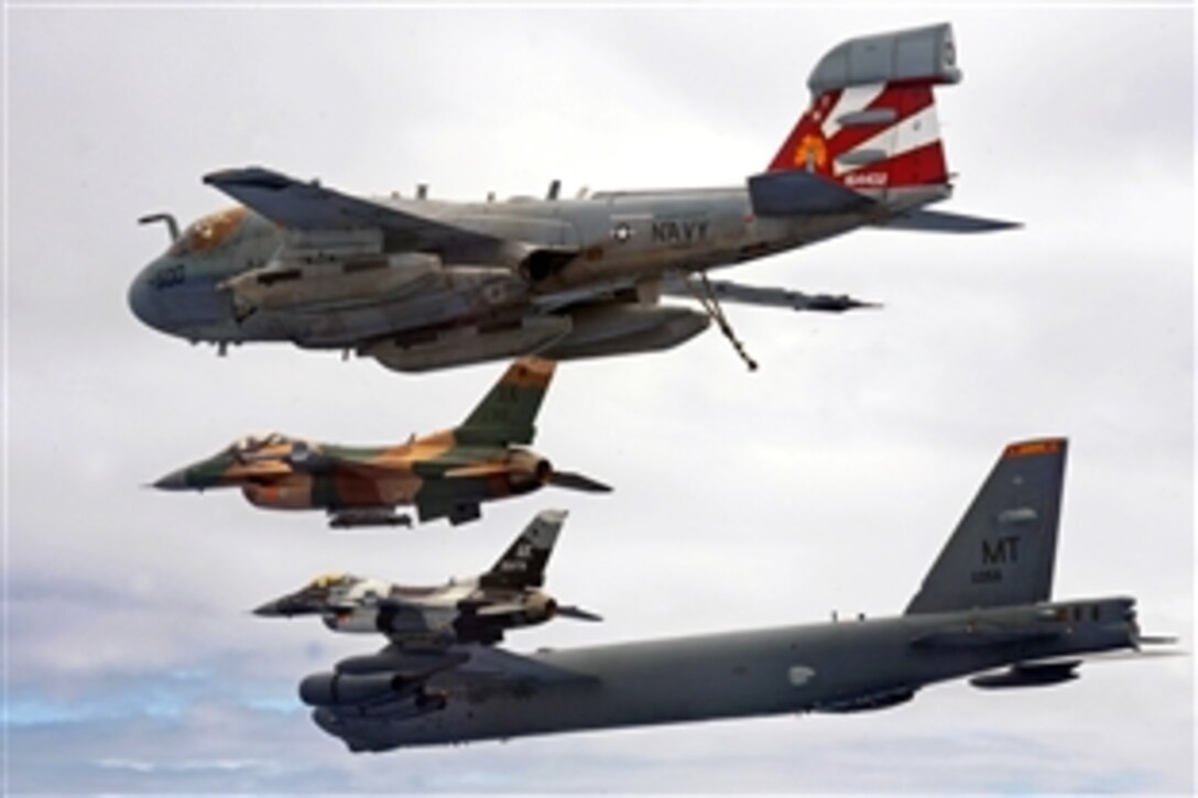 A B-52 Stratofortress from the 23rd Expeditionary Bomb Squadron leads a formation of U.S. Air Force F-16 Fighting Falcons and a U.S. Navy EA-6B Prowler over Guam during Cope North 09-1, Feb. 10, 2009. Cope North 09-1 is a bilateral exercise to enhance air operations in defense of Japan.