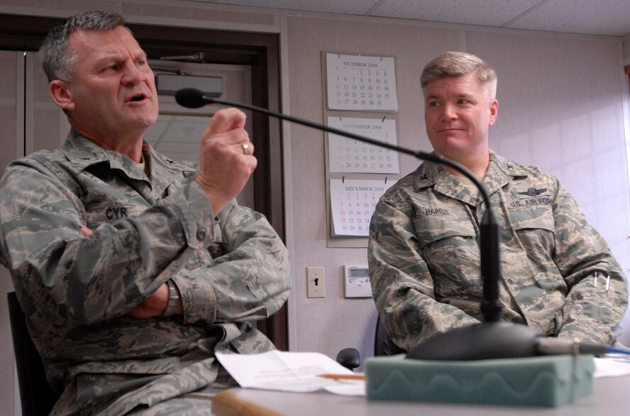 Chaplain (Brig. Gen.) David Cyr, Air Force deputy chief of chaplains and Col. J.D. "Wolf" Harris, 8th Fighter Wing commander, speak during the Aaron in the Morning radio show at Kunsan Air Base, Republic of Korea, Feb. 20, 2009. Chaplain Cyr visited the Wolf Pack to be the guest speaker at the National Prayer Luncheon.at Kunsan Air Base, Republic of Korea, Feb. 20, 2009. (U.S. Air Force Photo/Senior Airman Gustavo Gonzalez) 