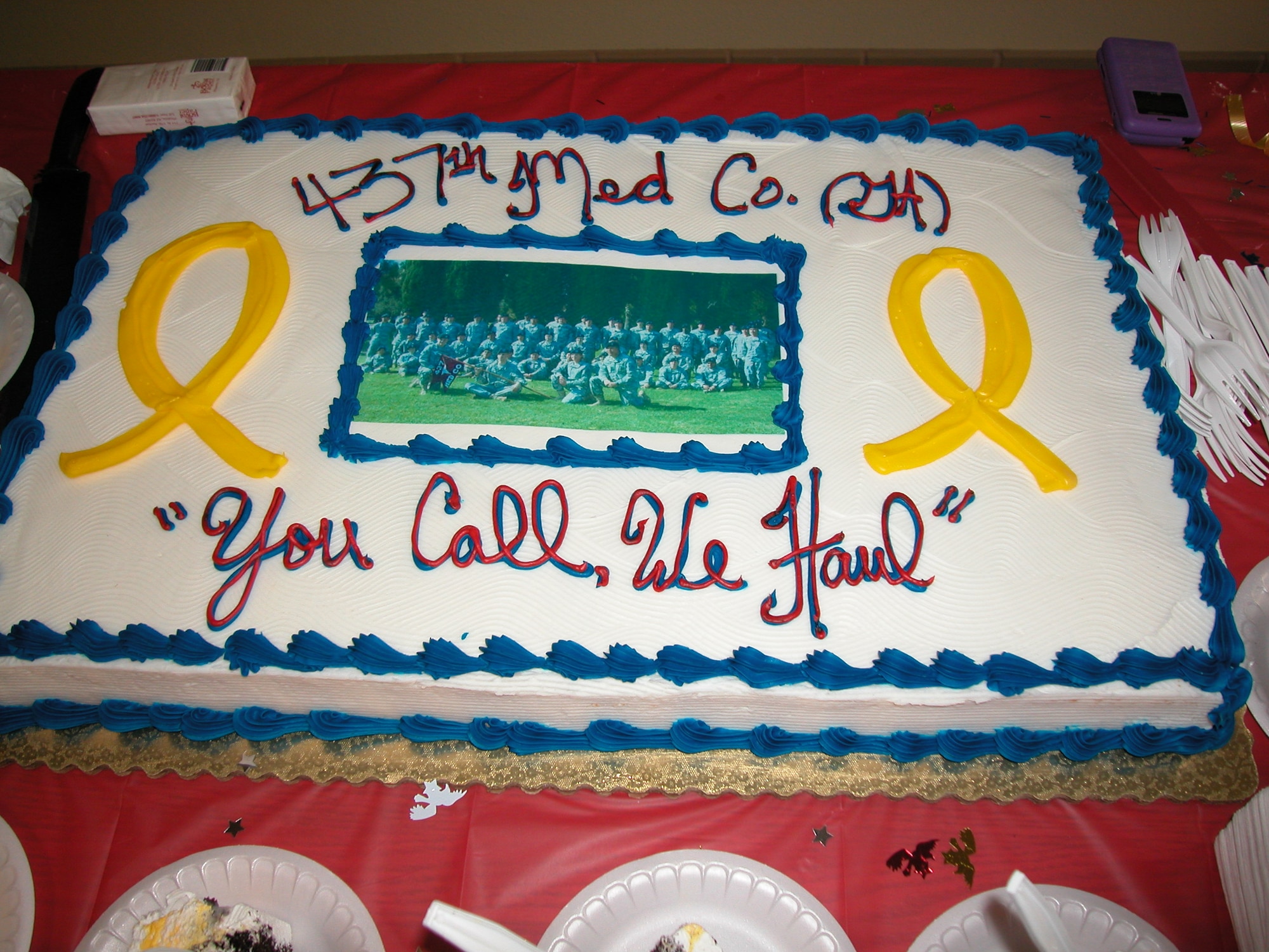 More than 300 people attended the deployment ceremony and were treated to refreshments and cake which contained the 437th Medical Company’s motto. Col. Irma Cooper, 176th Medical Group commander, Brig. Gen. Craig Bugno, 2nd Medical Brigade commander, and Maj. Gen. Lie-Ping Chang, 807th Medical Command, addressed the troops and audience. (U.S. Air Force photo by Maj. Don Traud)